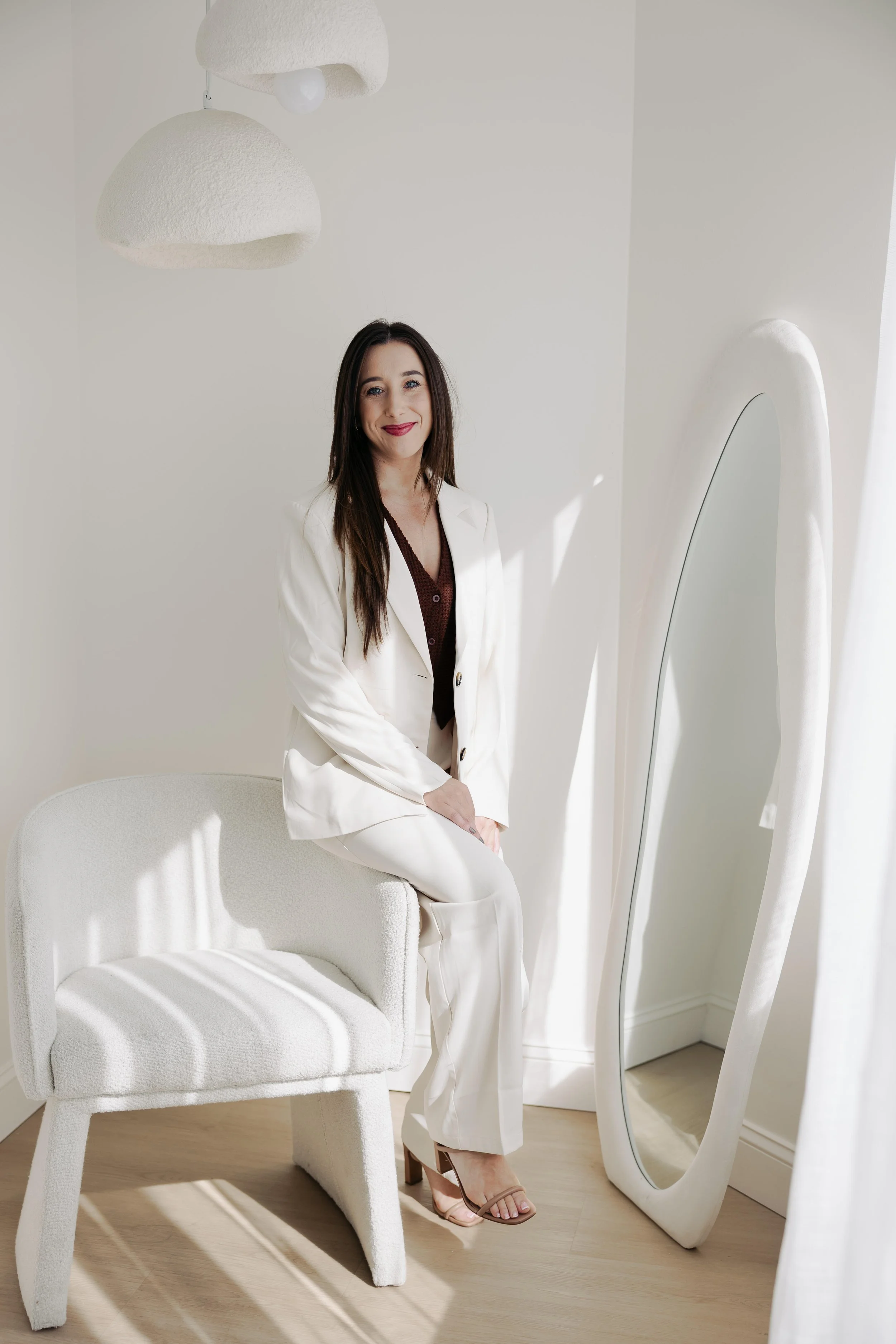 Therapist guiding client through CBT thought restructuring exercise