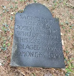 Gravestone with engraved text honoring Joseph Valentic, who died at age 51 on November 3, 1928.