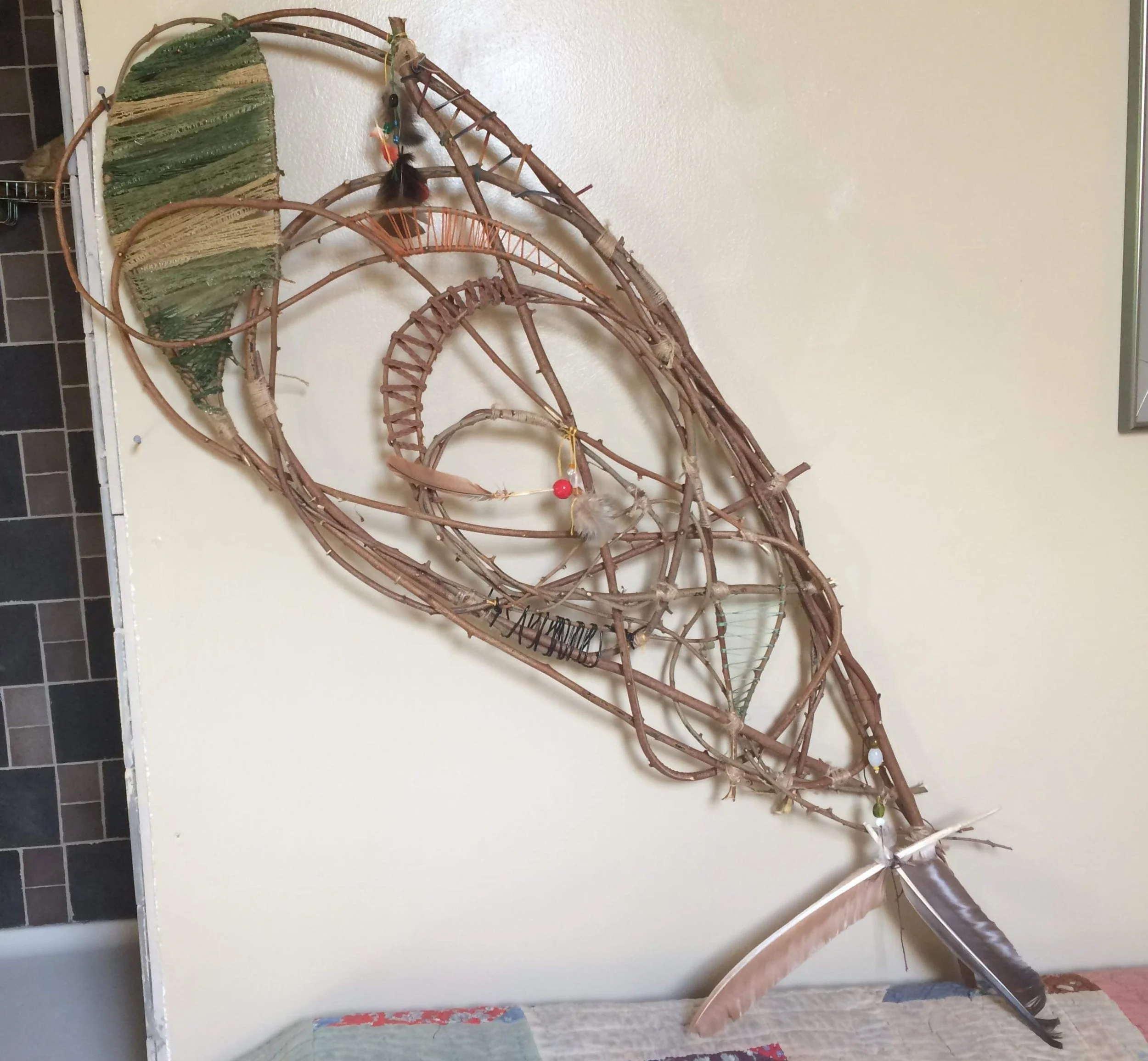 Weaver
Bent tree limbs, yarn, beads, found feather
Sequatchie Valley, Tennessee, 2020