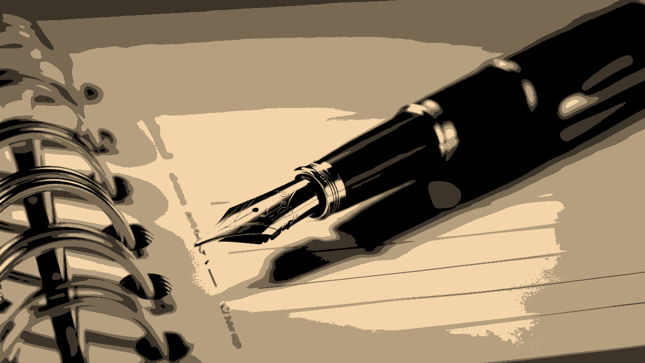 Calligraphy pen on a notepad