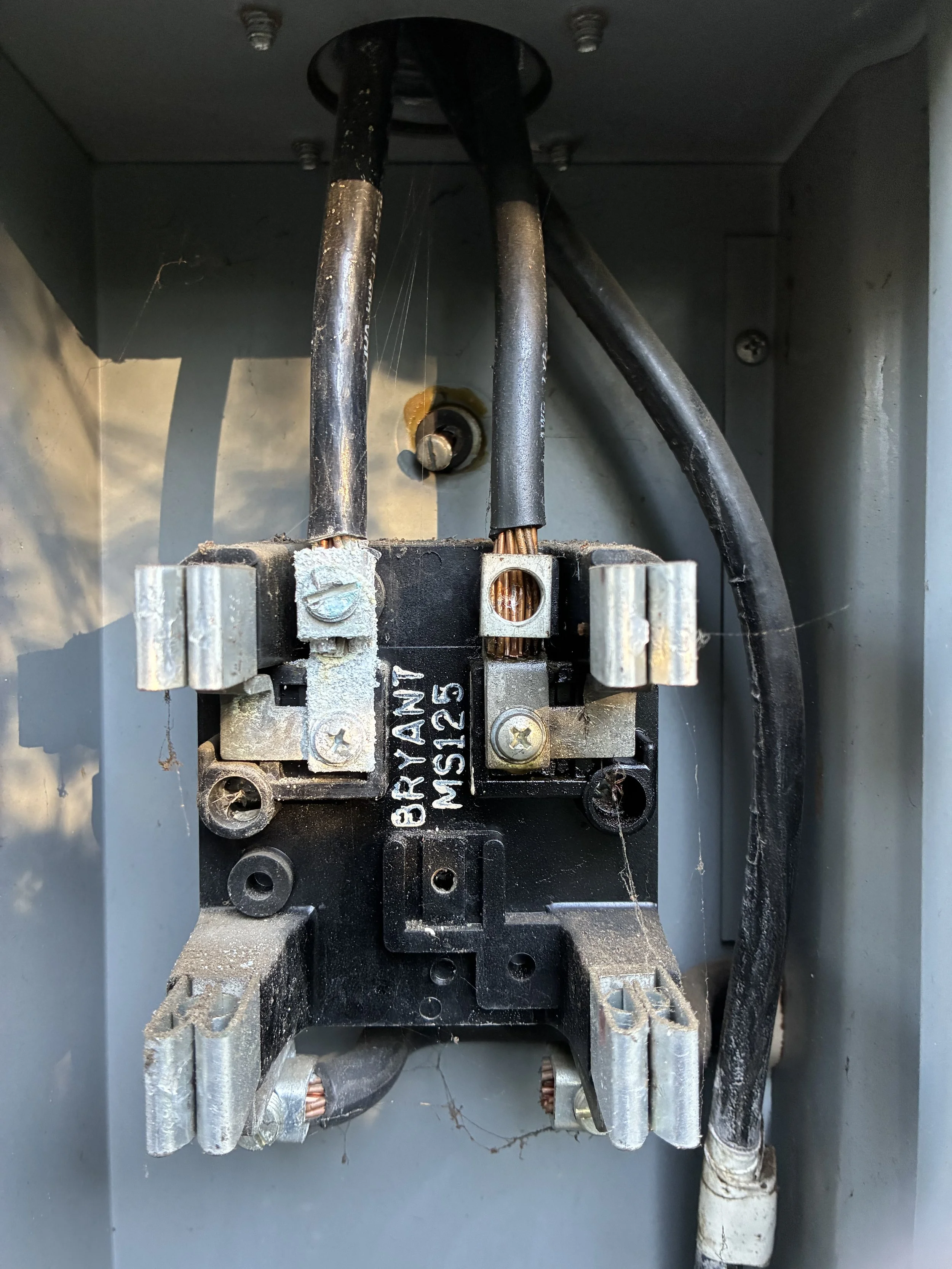 Collins Electric technician installing a modern panel for improved electrical capacity in Rohnert Park, CA.