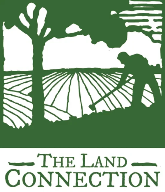 Silhouette of a person working in a field with a large tree and clouds in the background, and text that reads 'The Land Connection'.