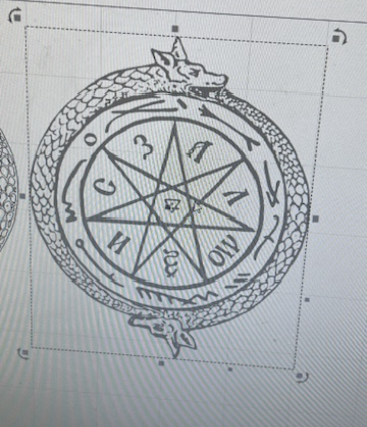 The pattern cut into the signet ring using my lasercutter.