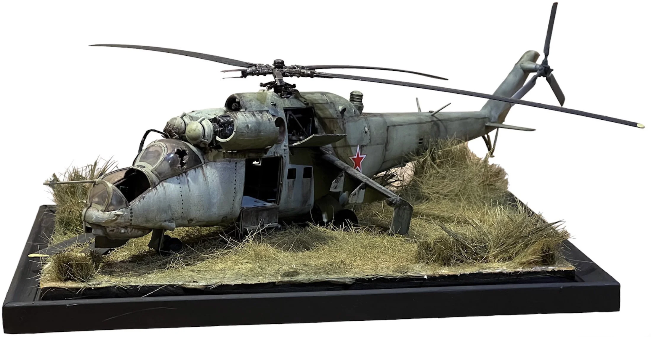 Diorama of an abandoned Soviet MI-24 Helicopter made and painted by me.