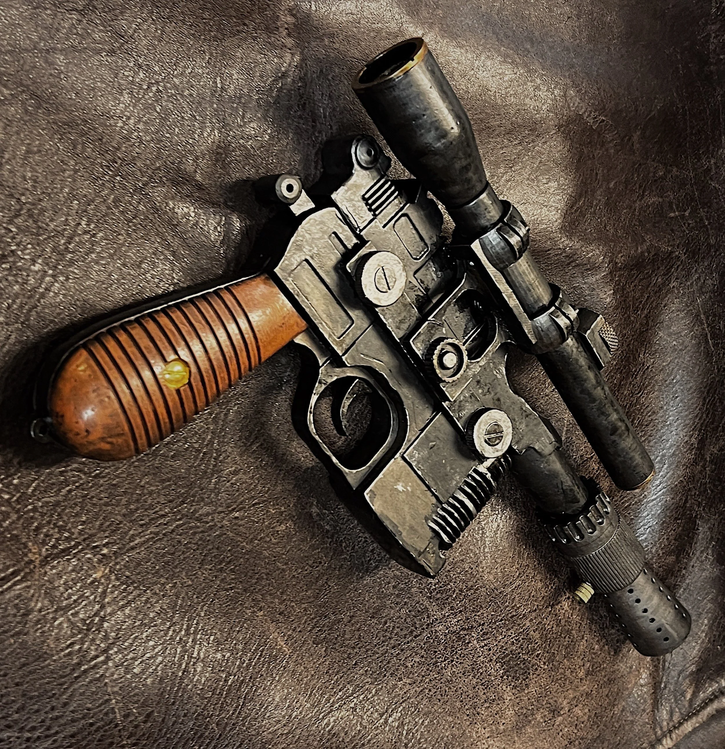 The Han Solo blaster replica after paint and weathering by me.