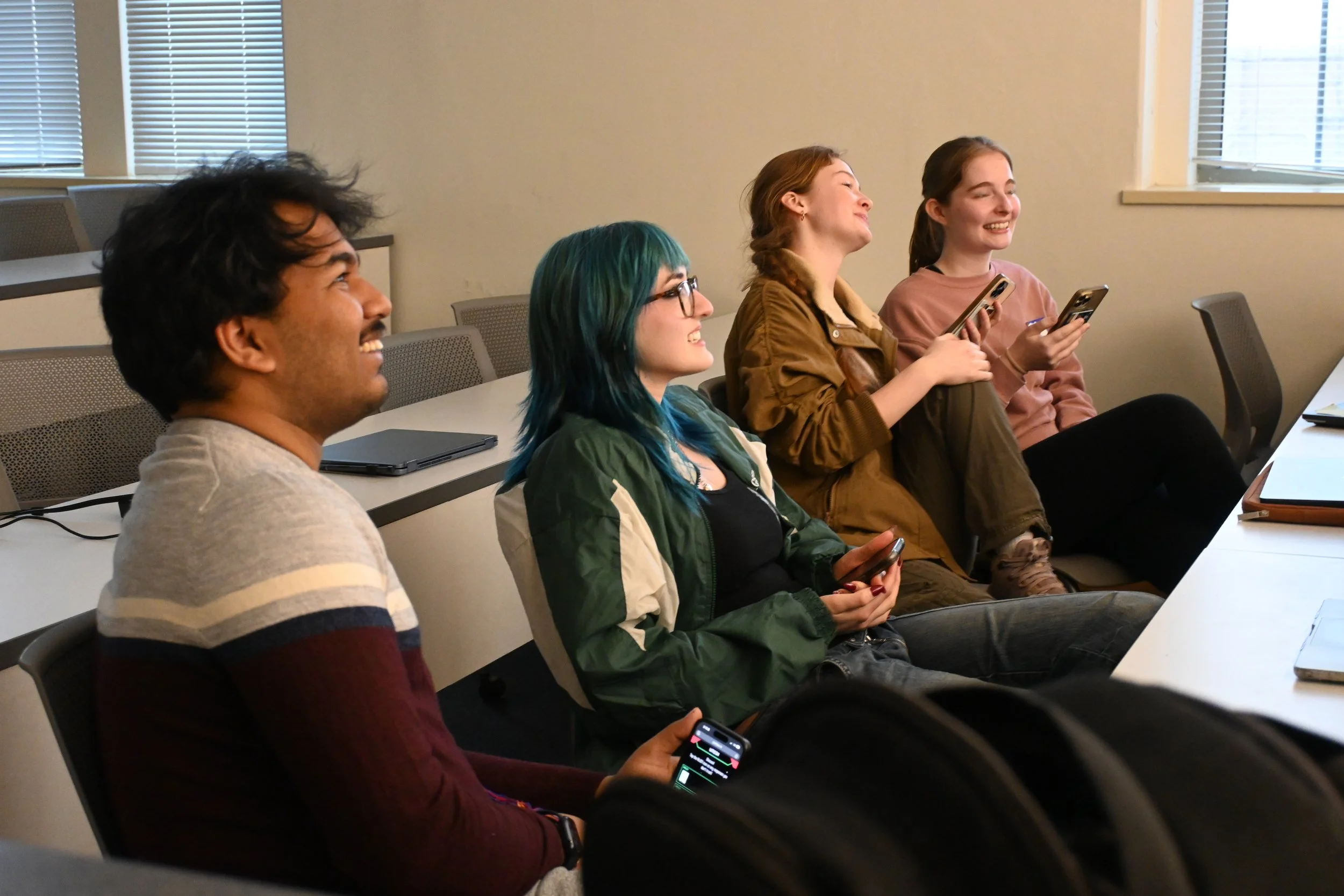In the image, Umesh Ponugupati is on the far left, followed by Hailey Nelson, then Sophia Karako, with Carolina Rebelo positioned at the far right.
