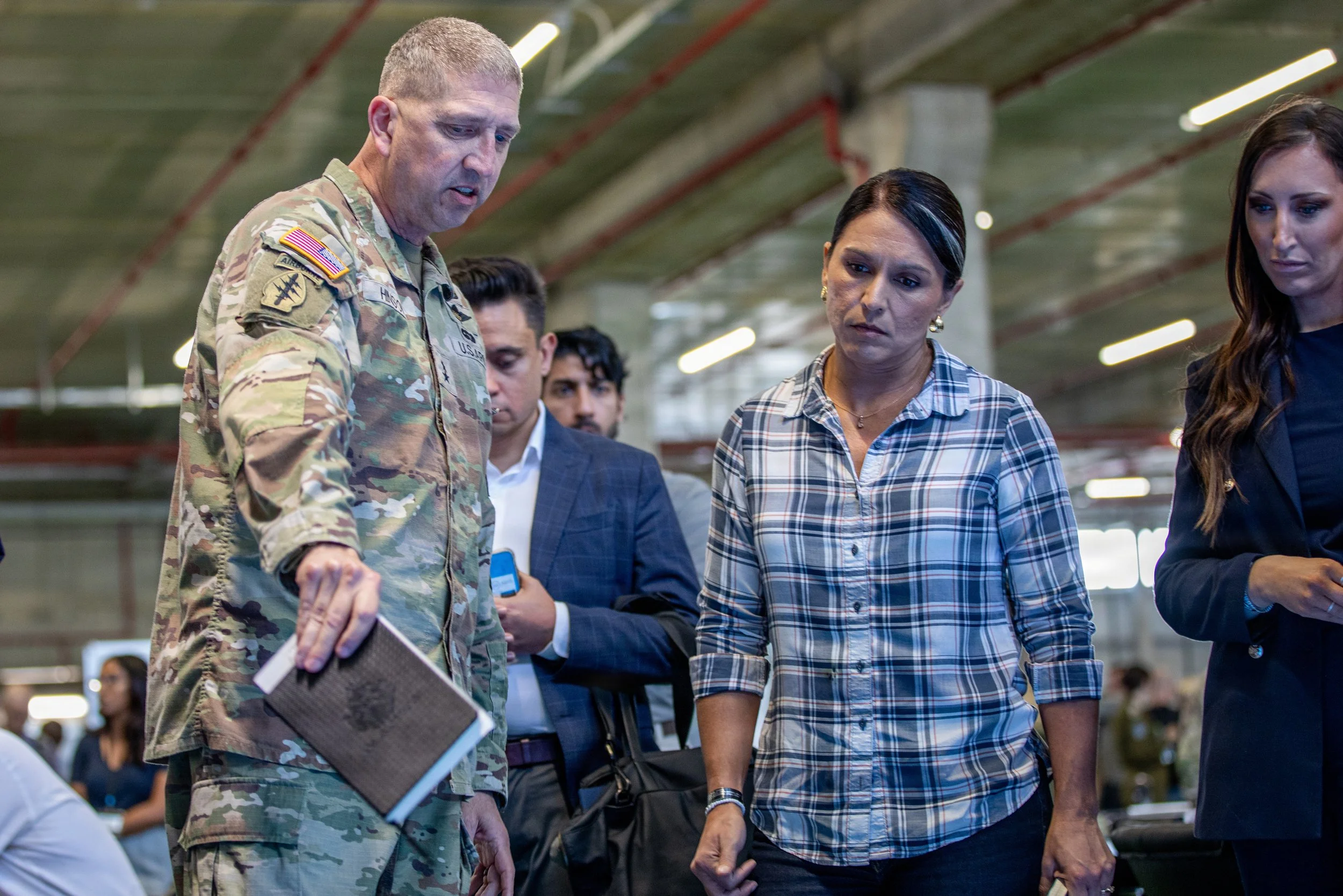 U.S. Army Maj. Gen. Brad Hinson provides a logistics brief to the U.S. Director of National Intelligence, Tulsi Gabbard, during a visit inside the Civil-Military Coordination Center (CMCC) on Nov. 3, 2025, in Israel. (U.S. Army photo by Spc. Kathryn 