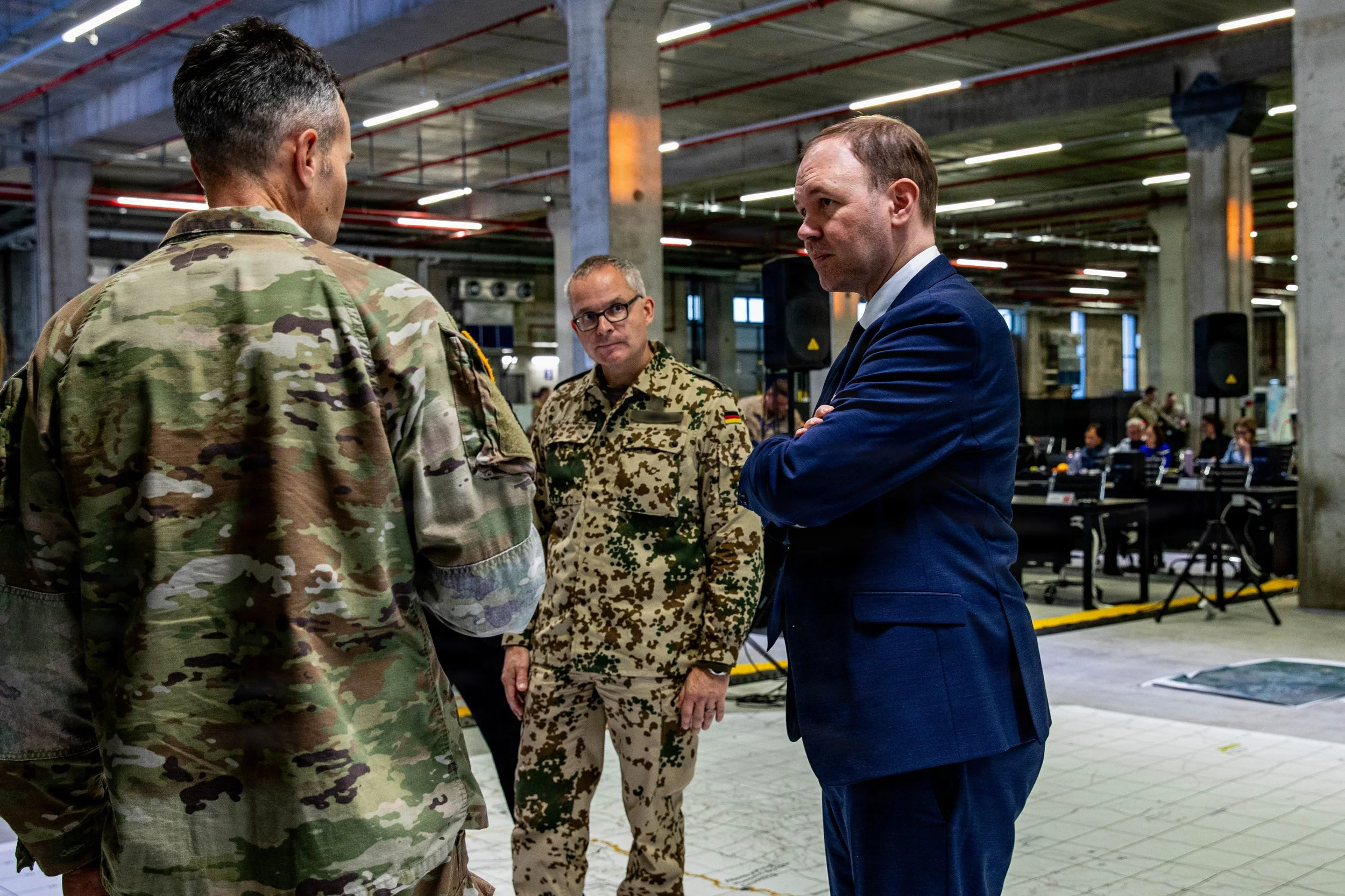 KIRYAT GAT, Israel -- Nils Hilmer, German State Secretary at the Federal Ministry of Defence, speaks with U.S. Army Col. Stuart Peebles during a visit to the Civil-Military Coordination Center (CMCC), Dec. 17, 2025. The CMCC hosts more than 60 nation