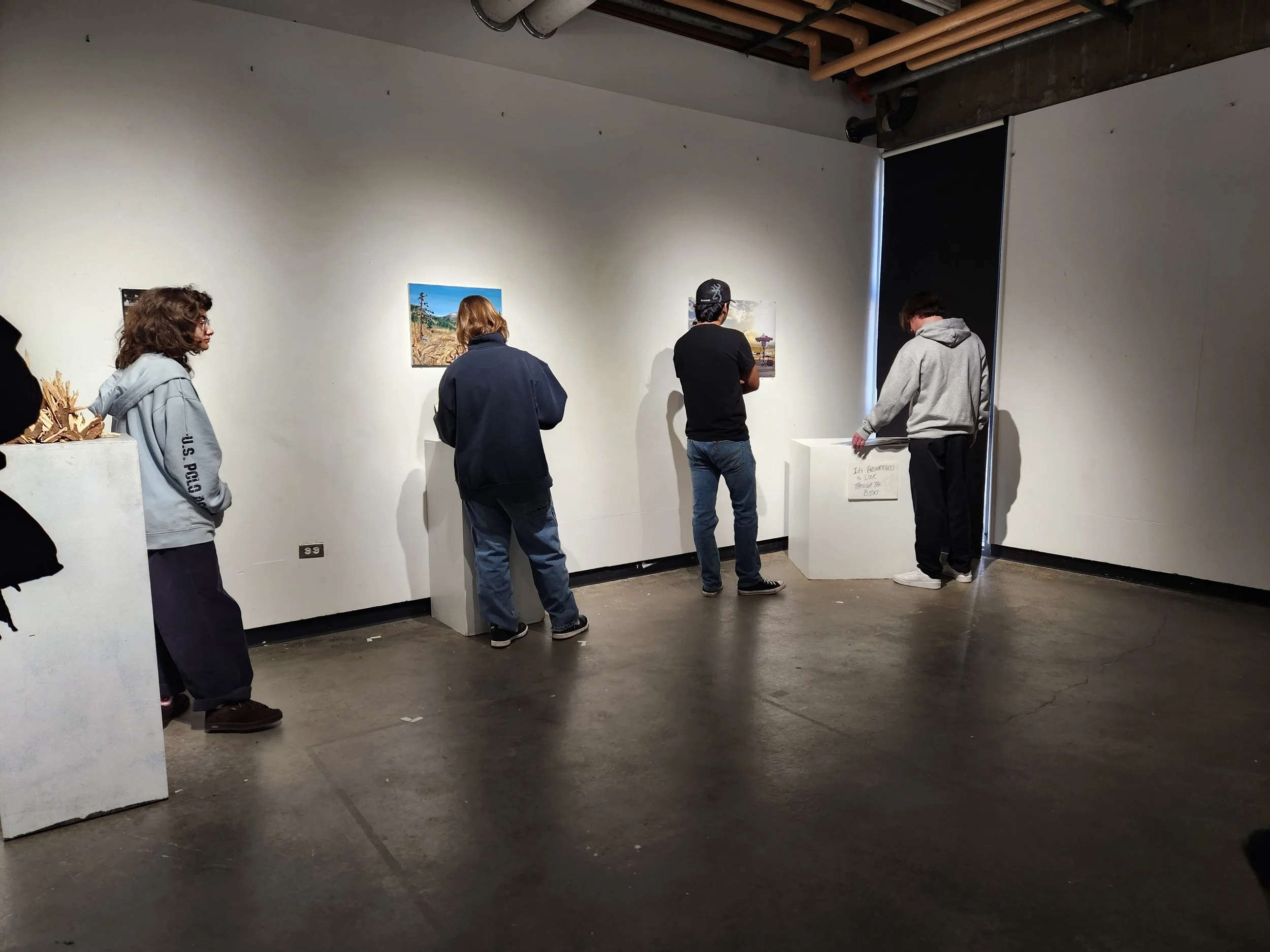 Image of CSU Department of Art and Art History students browsing a class studio for ART170: Time and Structure. Image taken by Kathryn Skonning