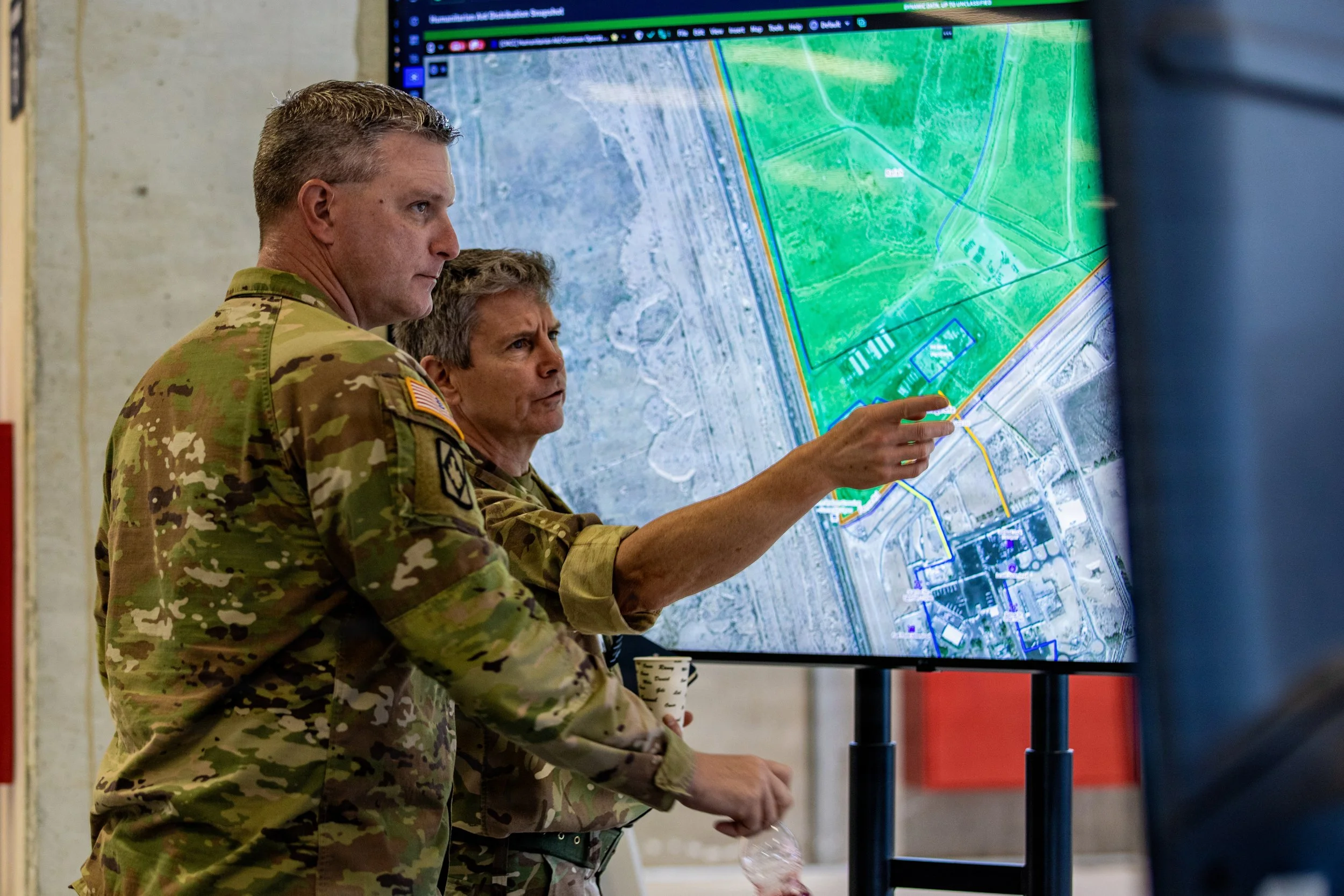 KIRYAT GAT, Israel -- U.S. Army Sgt. 1st Class Gregory Breha works to deconflict humanitarian assistance delivery routes in Gaza in the Civil-Military Coordination Center (CMCC), Dec. 20, 2025. (U.S. Army photo by Sgt. Kathryn Skonning)