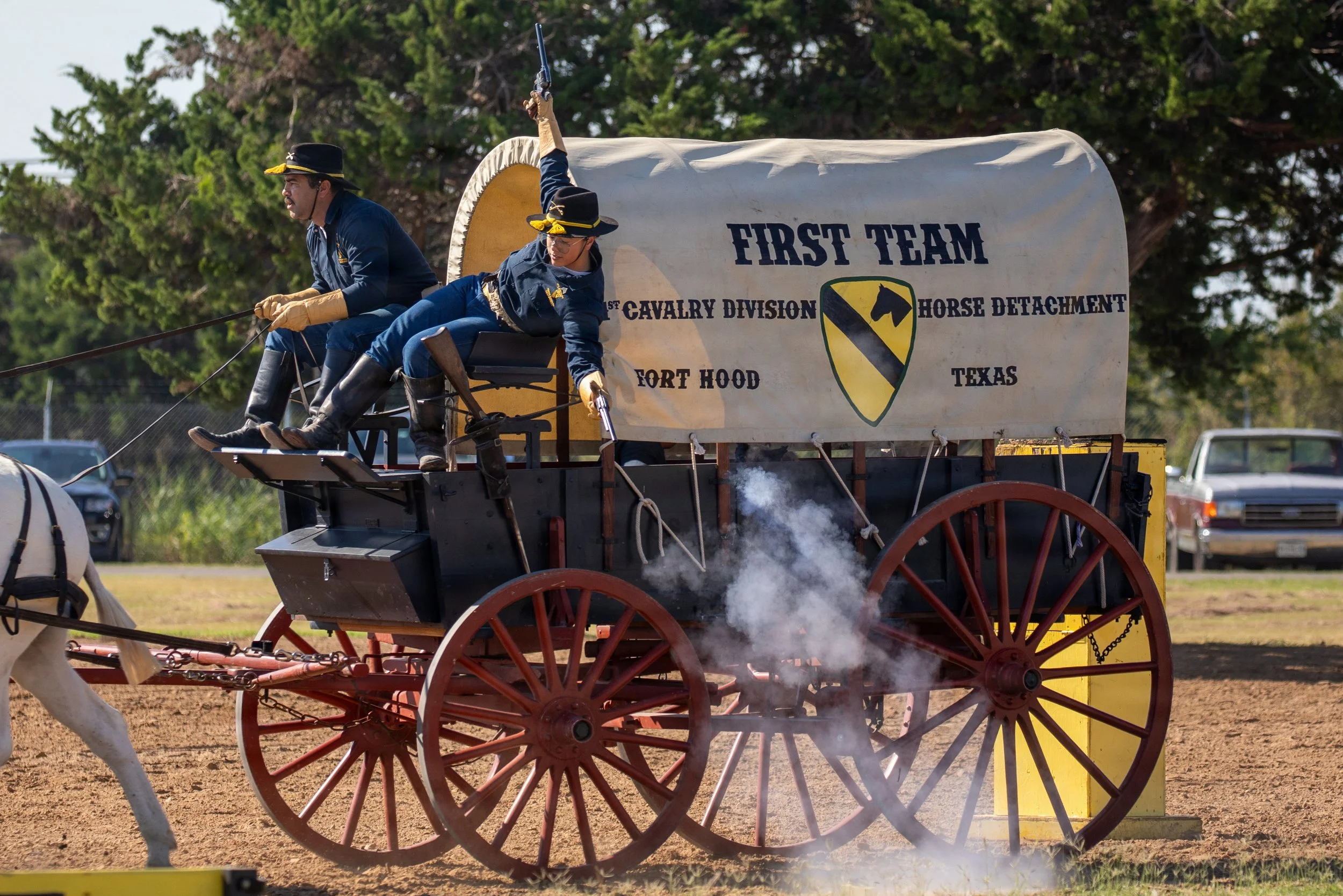 U.S. Army Sgt. Alexis Luna, Trooper with the Horse Cavalry Detachment, 1st Cavalry Division, fires a restored 1875 Colt Single Action, 45 Caliber Revolver during a mounted cavalry demonstration in the detachment riding arena at Fort Hood, Texas, Oct.