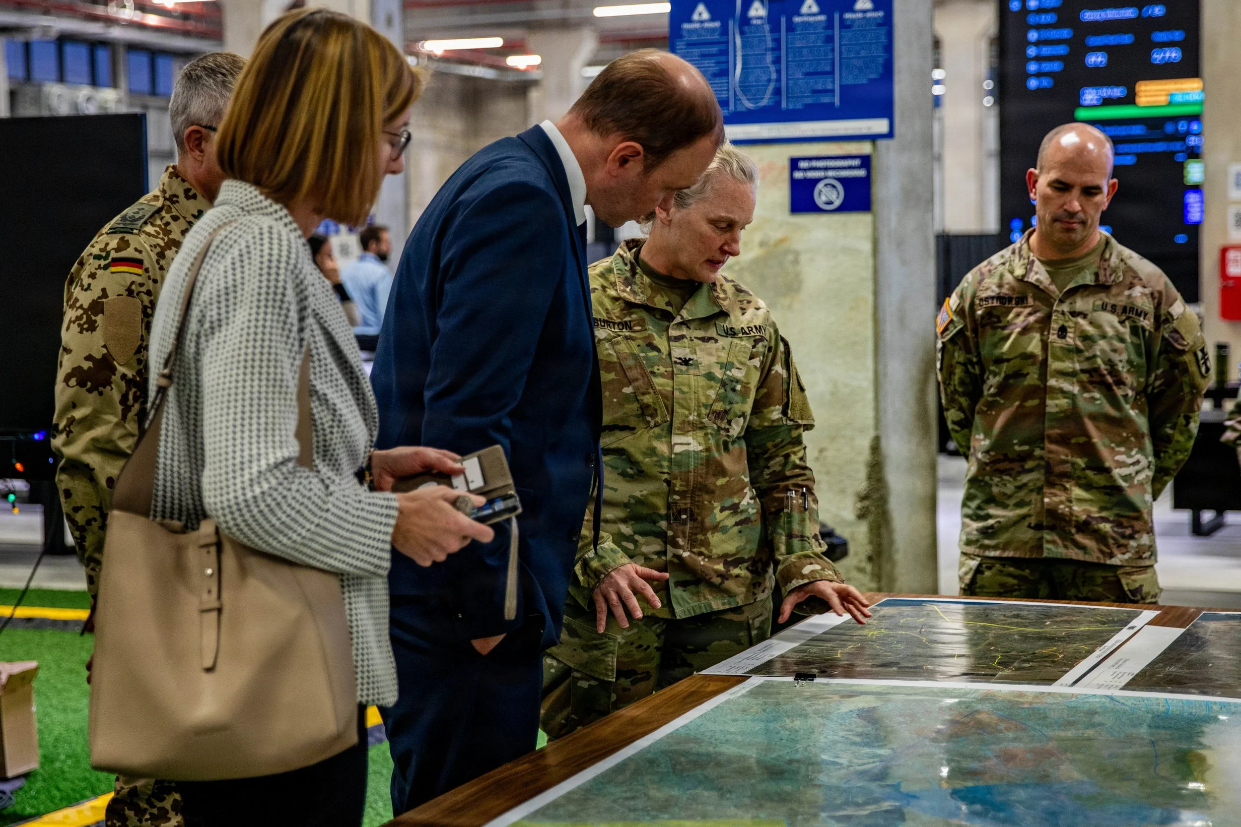 KIRYAT GAT, Israel (Dec. 17, 2025) U.S. Army Col. Christina Burton speaks with Nils Hilmer, German State Secretary at the Federal Ministry of Defence, about Gaza rubble clearing operations coordinated by the Civil-Military Coordination Center (CMCC),