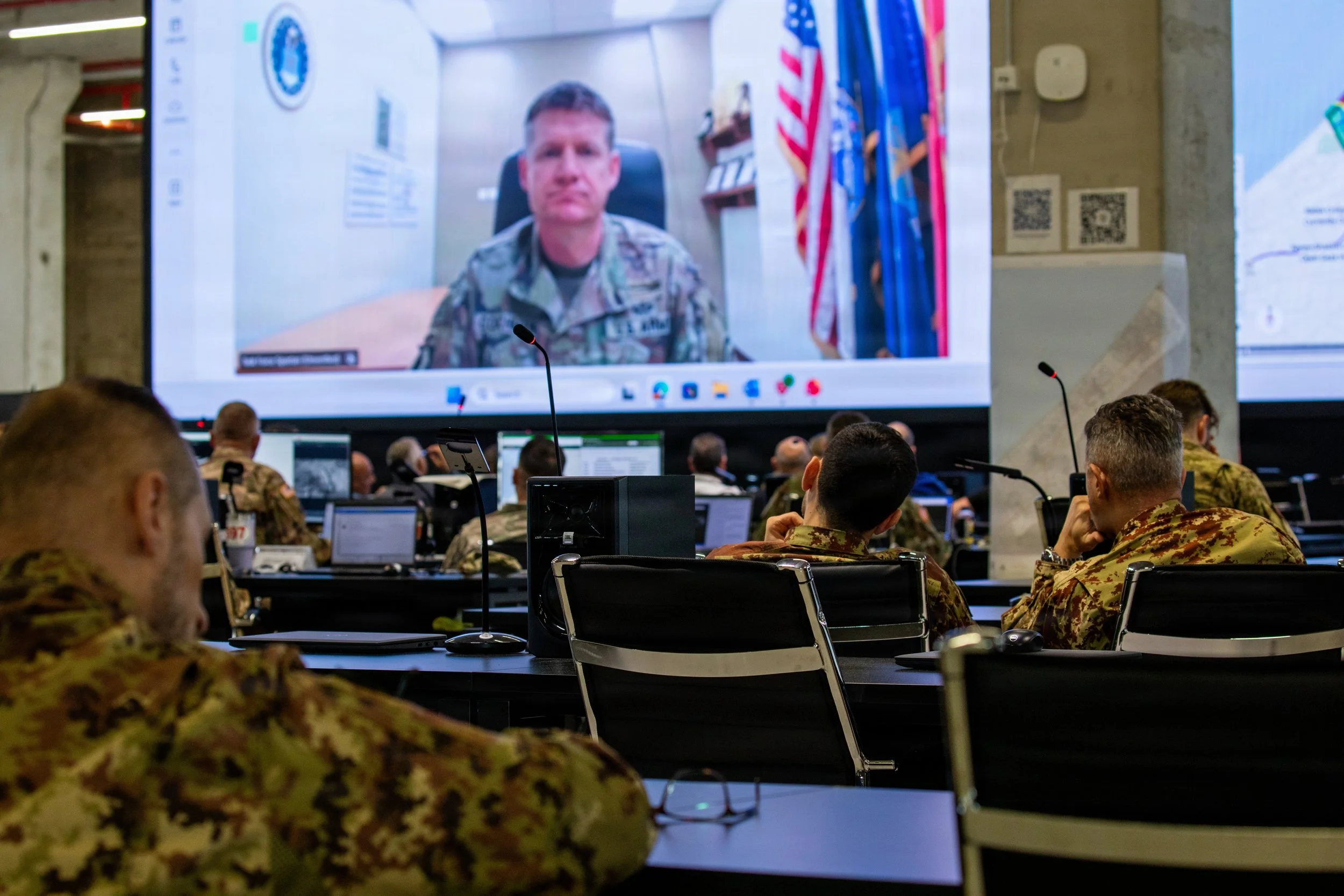 Soldiers assigned to U.S. Army Central, multinational armed forces, and representatives of Non-Government Organizations (NGO) attend a morning update briefing inside the Civil-Military Coordination Center (CMCC) on Nov. 30, 2025, in Israel. The CMCC 