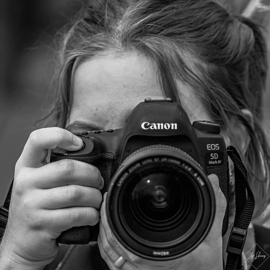 Image of Kathryn taking a picture. Image taken by Leigh Skonning.