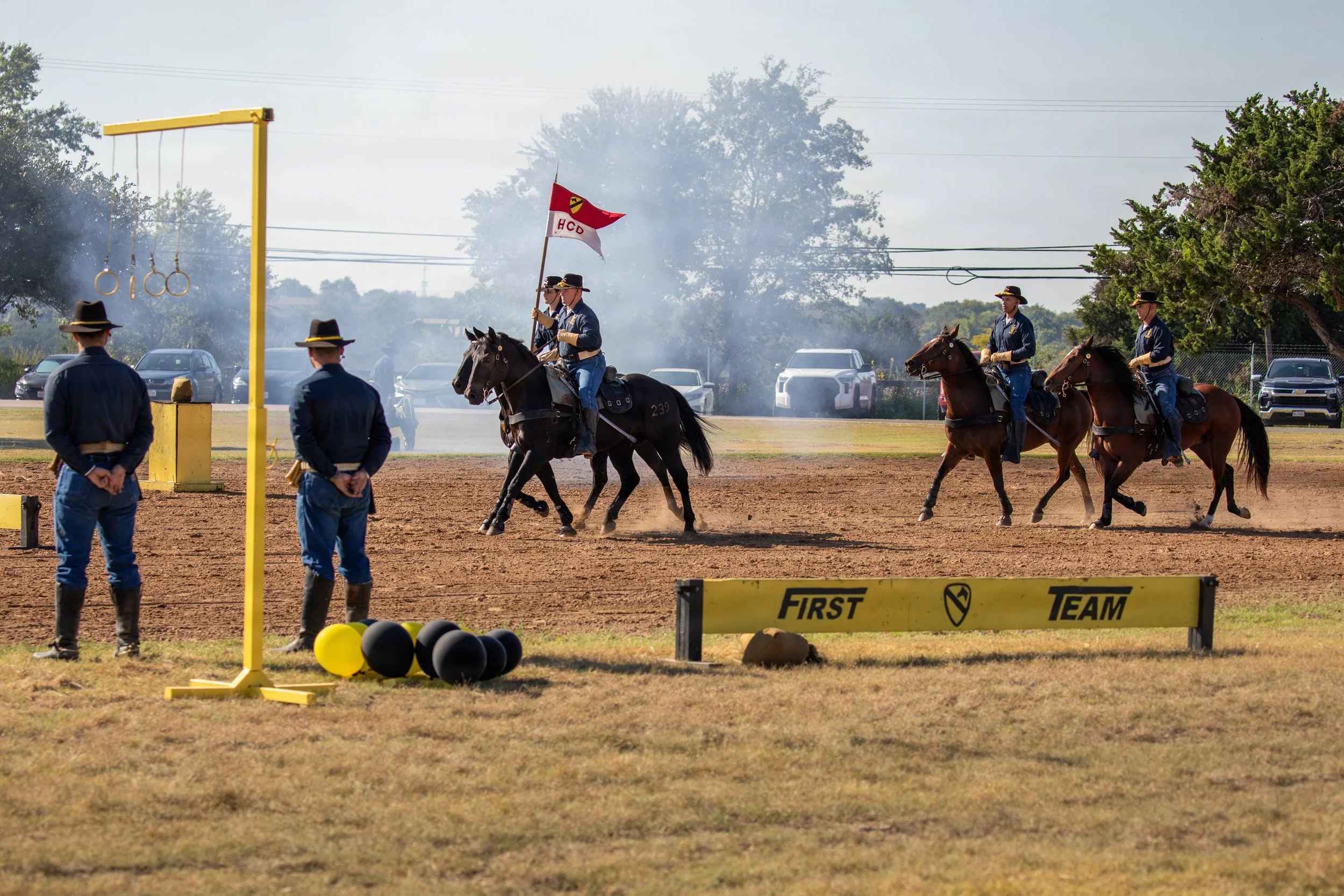 U.S. Army Troopers with the Horse Cavalry Detachment, 1st Cavalry Division, enter the riding arena for a mounted cavalry demonstration, Fort Hood, Texas, Oct. 2, 2025. The detachment preserves historical military traditions and operates as an 1870s H
