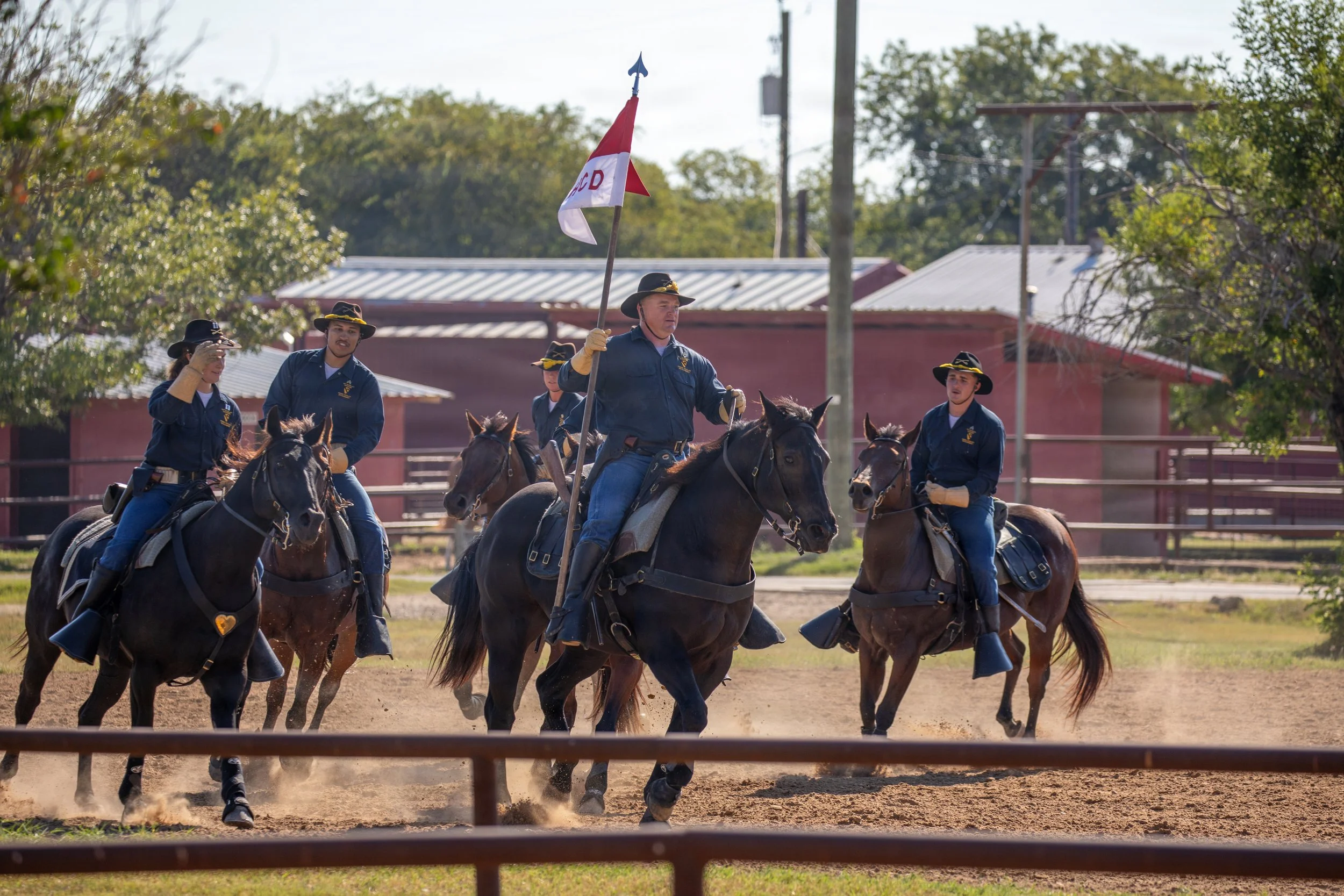 U.S. Army Troopers with the Horse Cavalry Detachment, 1st Cavalry Division, enter the detachment riding arena during a mounted cavalry demonstration at Fort Hood, Texas, Oct. 2, 2025. The detachment preserves historical military traditions and tactic