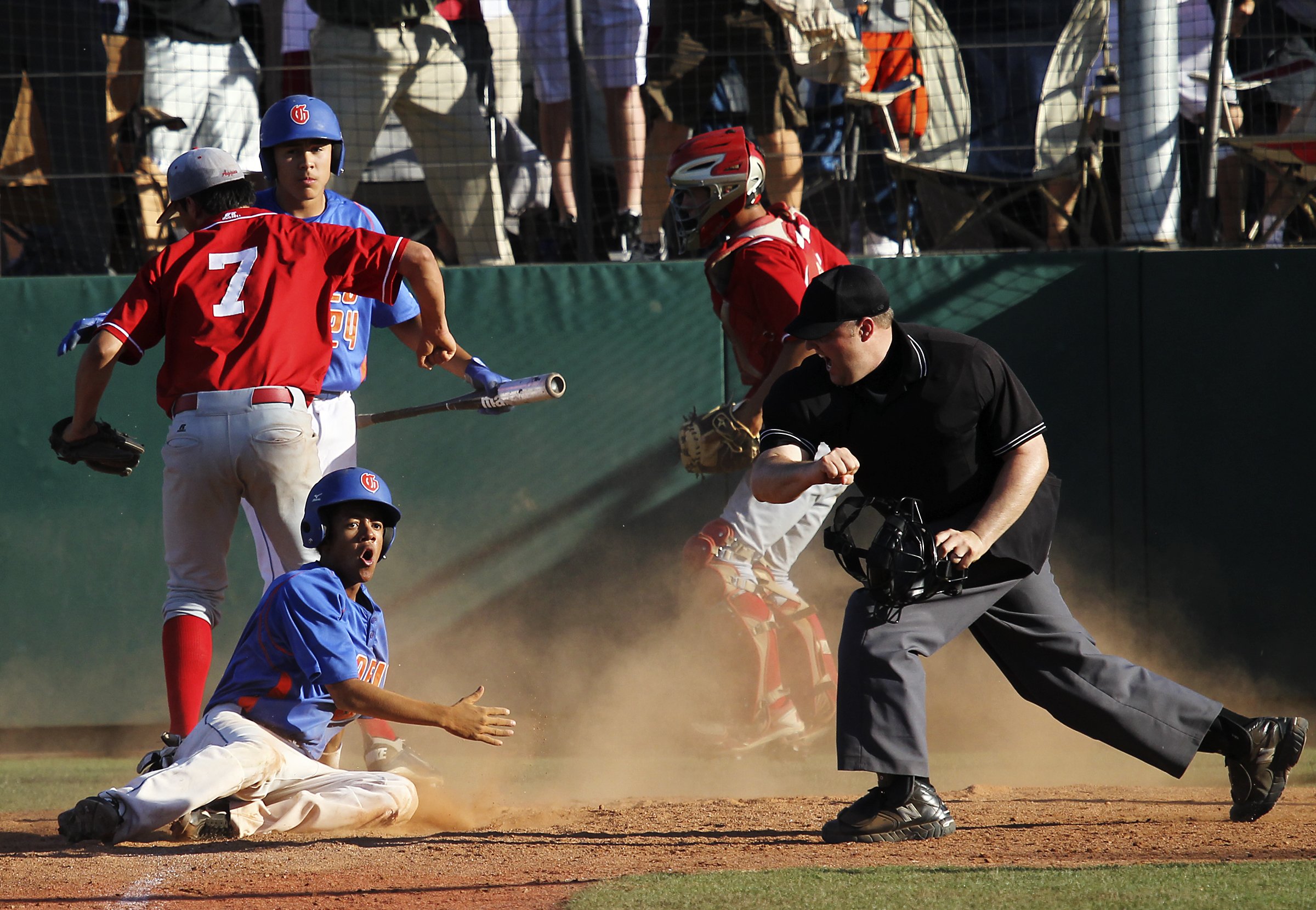 Bishop Gorman's Willie Jumper reacts after getting tagged out at home plate by Arbor View's Zach Quintana (7) to end the game at Bishop Gorman during a Sunset Region baseball game on Wednesday, May 9, 2012. Arbor View won the game 9-8.