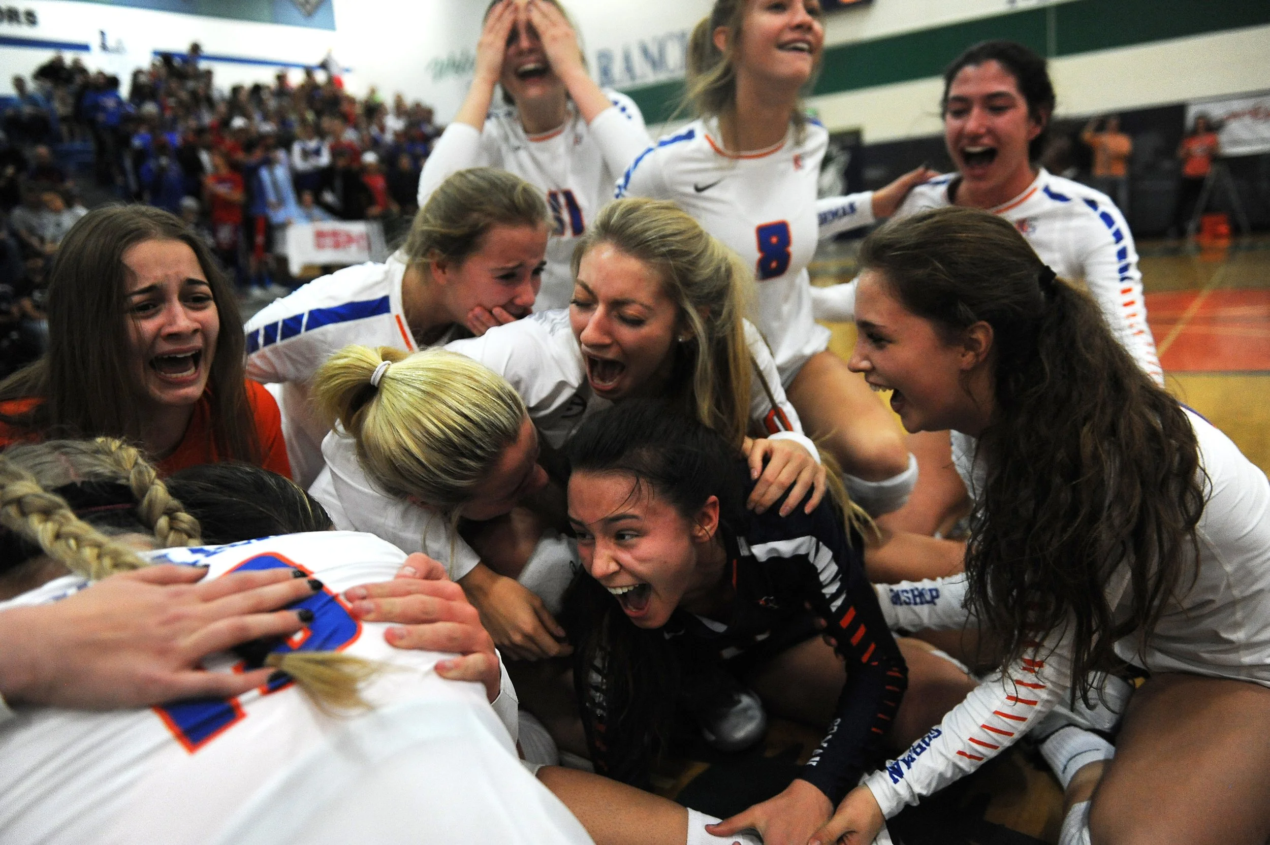 Bishop Gorman players celebrate after defeating Reno 3-1 to win the NIAA 4A state volleyball championship at Damonte Ranch High School in Reno on Nov. 12, 2016. 