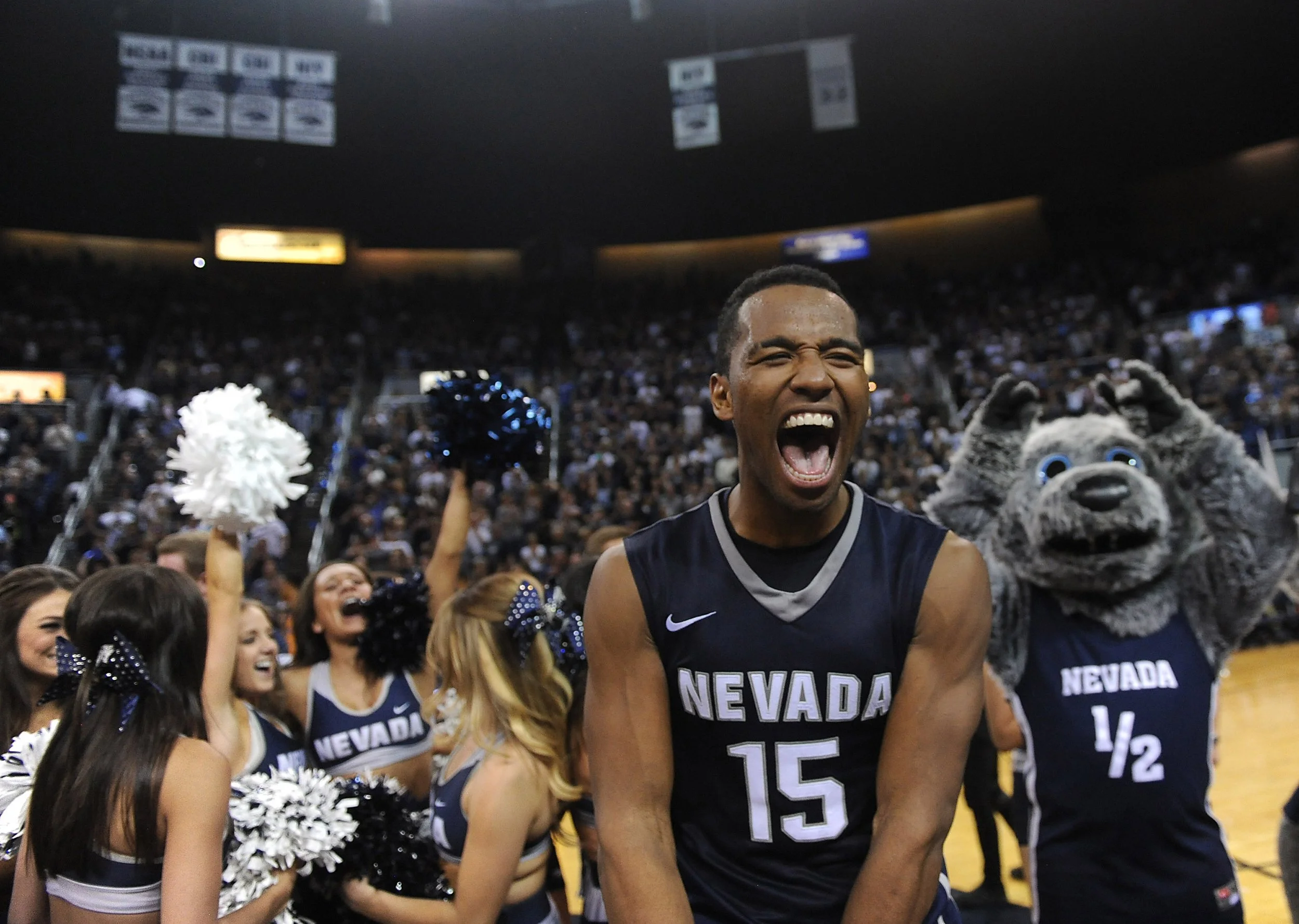 Nevada's D.J. Fenner celebrates after defeating Morehead State during their College Basketball Invitational tournament championship game at Lawlor Events Center in Reno on April 1, 2016.