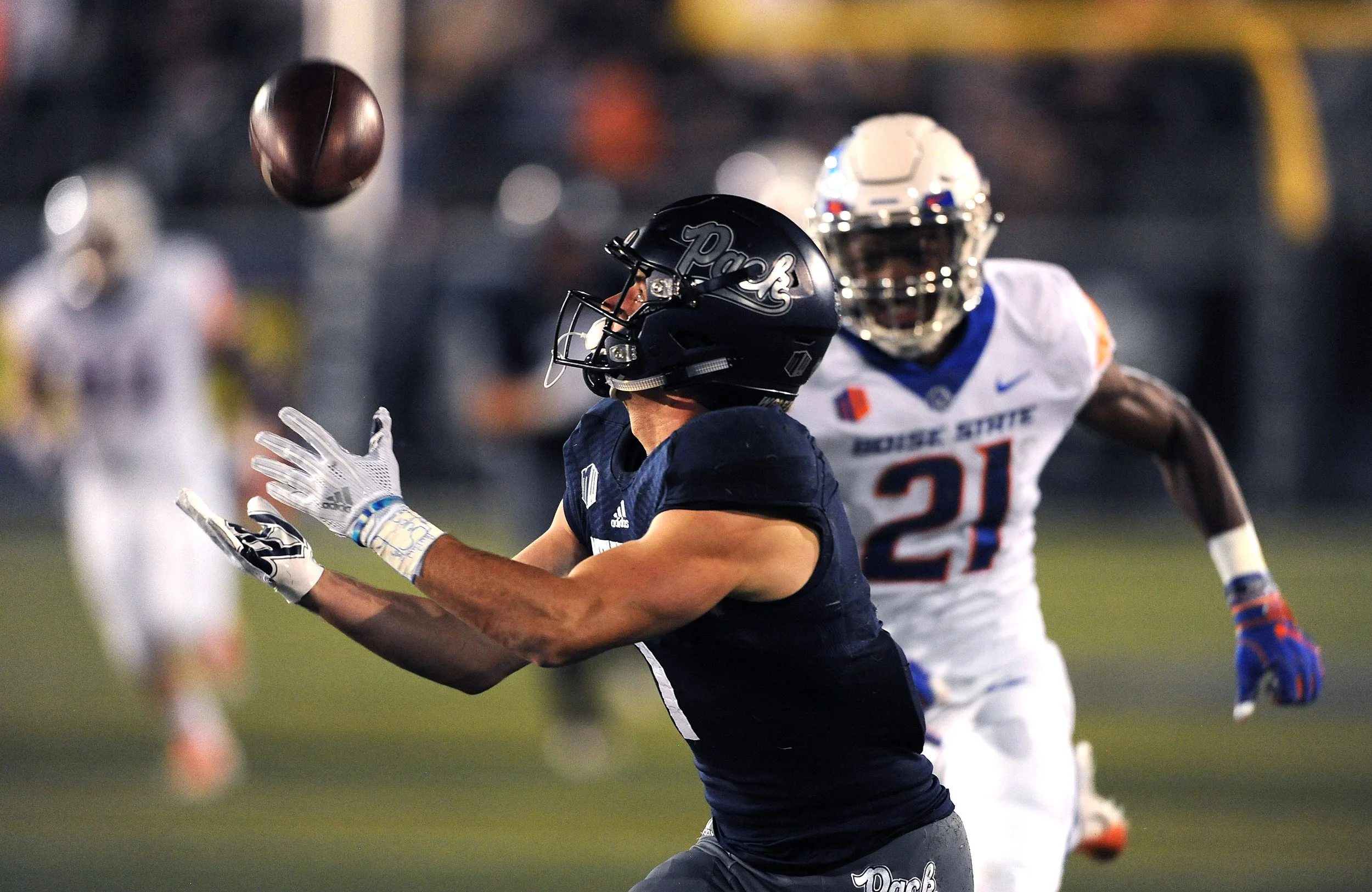 Nevada's McLane Mannix hauls in a long pass while taking on Boise St. during their football game at Mackay Stadium in Reno on Oct. 13, 2018.