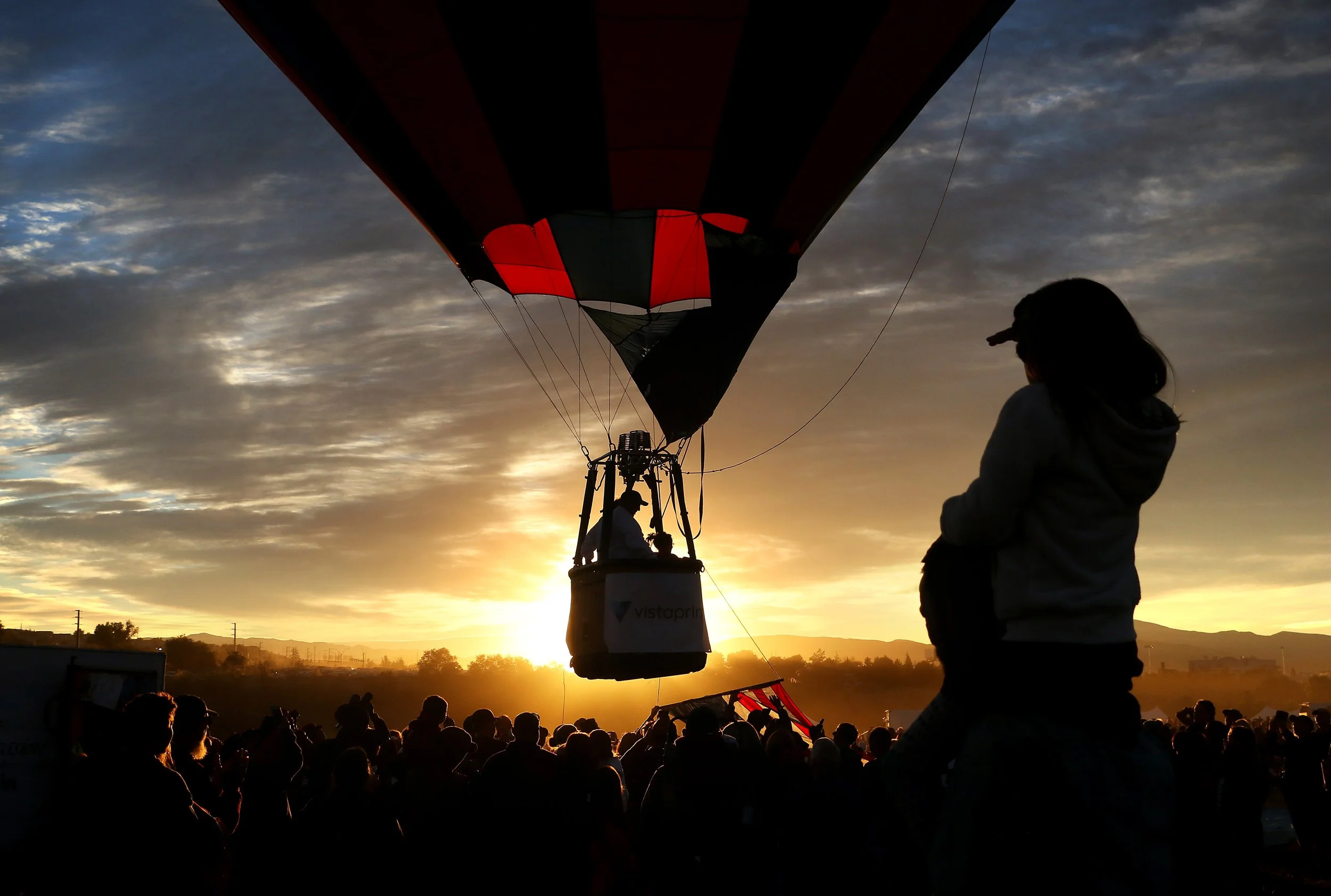 The mass ascension begins at sunrise during the Great Reno Balloon Race at Rancho San Rafael Regional Park in Reno on Saturday morning, Sept. 8, 2018.
