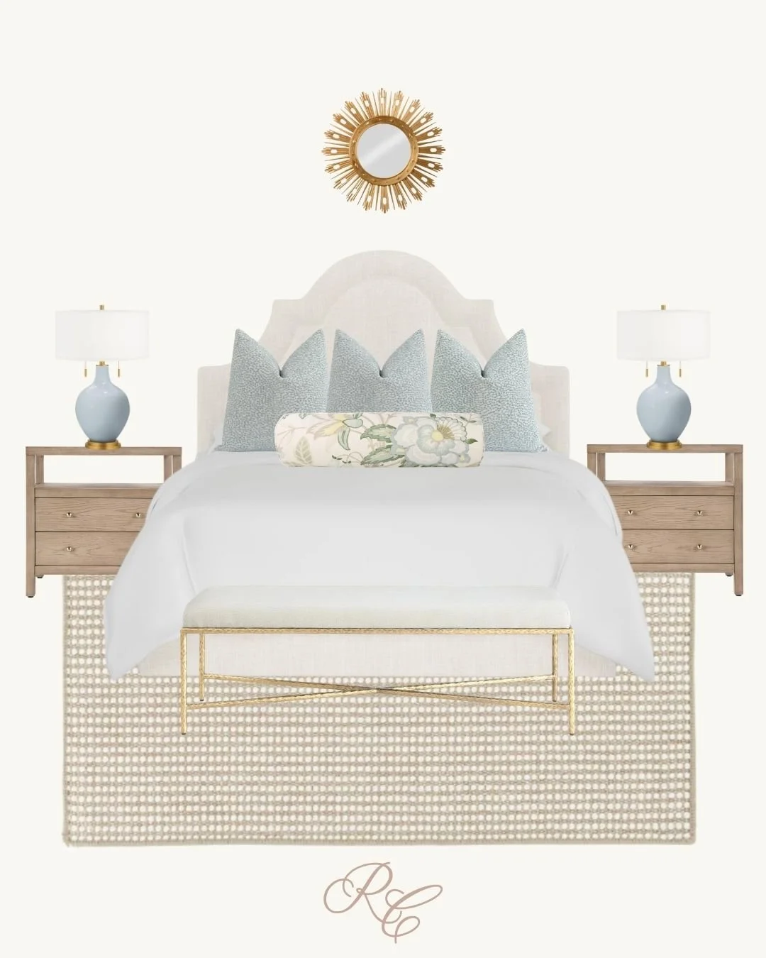 Elegant bedroom with a white bed, blue pillows, and light wood nightstands with lamps, golden framed mirror above, beige bench at foot of bed, and monogrammed initials RC at bottom.
