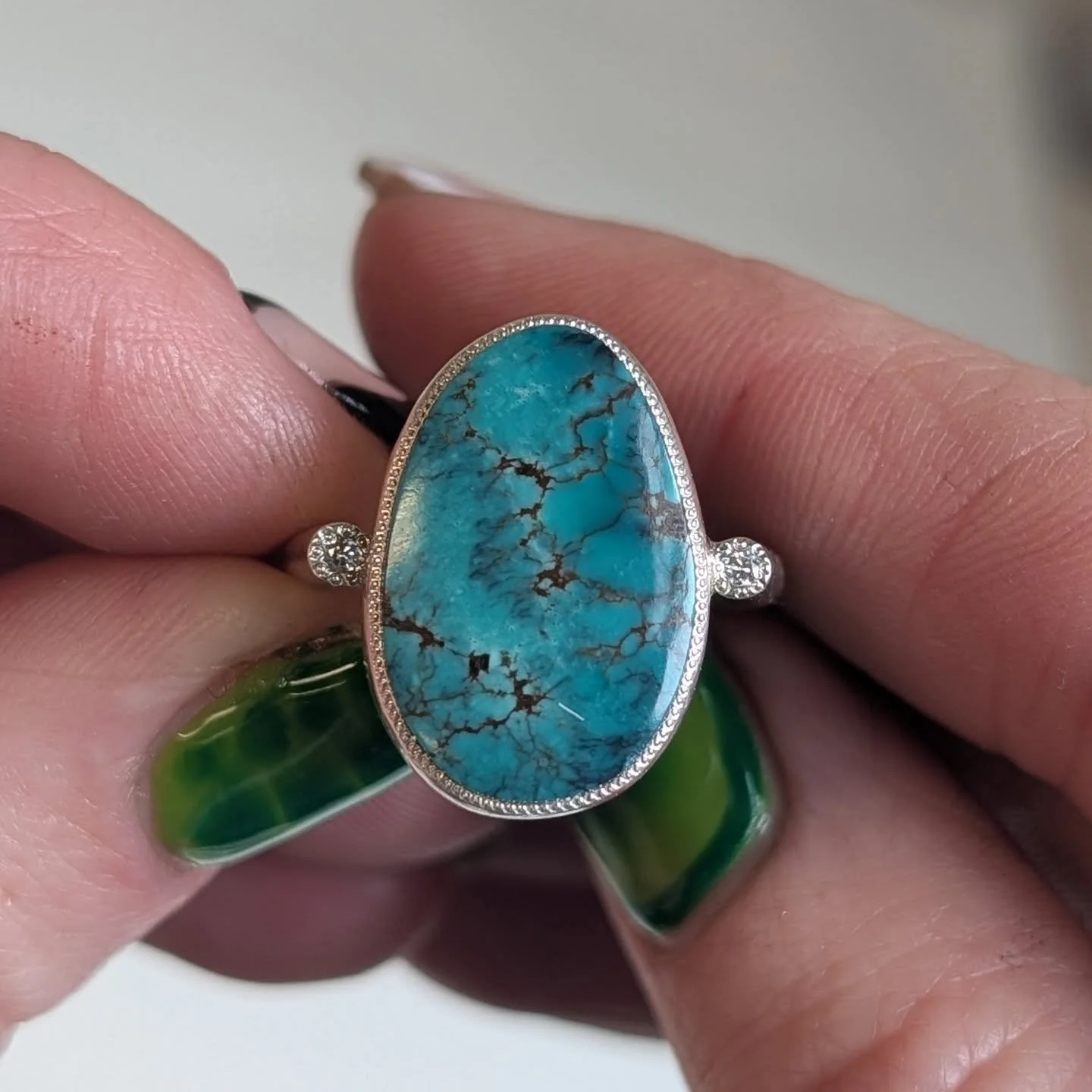 This beautiful turquoise was in my teachers collection, and when she passed away it was given to me. Though I can't say which mine it came from, it is old stock, southwest origin. The delicate webbing and placid blue are becoming difficult to find. E