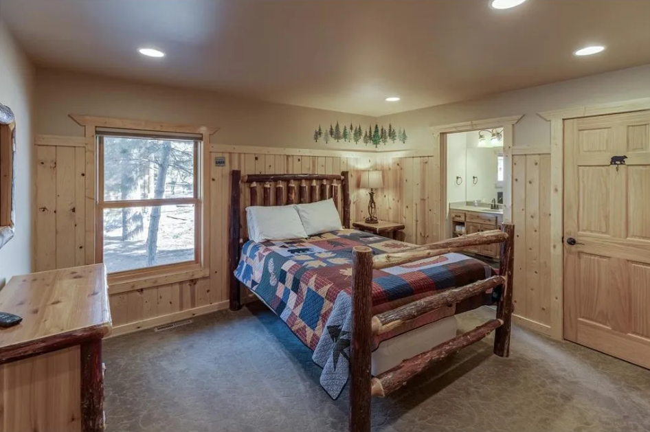 BEDROOM 1 - Main Floor: Queen Suite w/ Twin Trundle