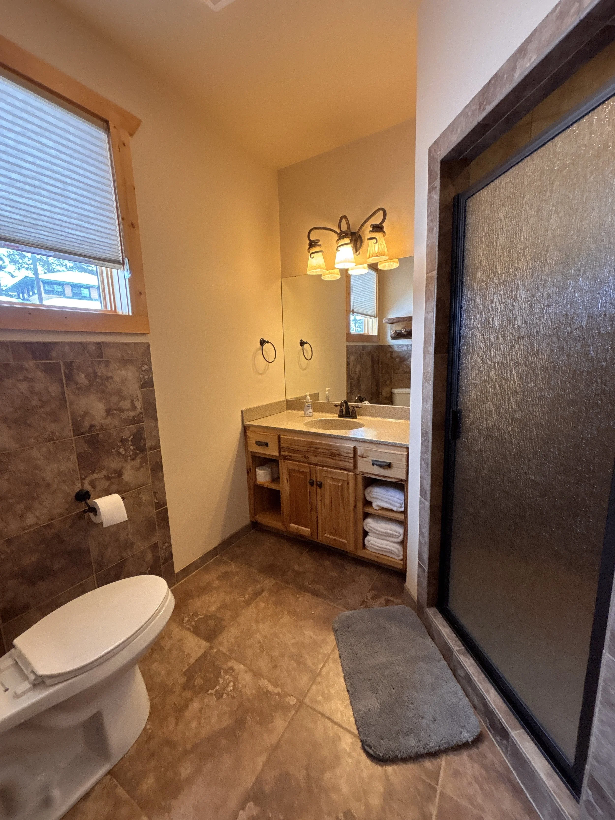 BEDROOM 1 - Main Floor: Queen Suite Bathroom