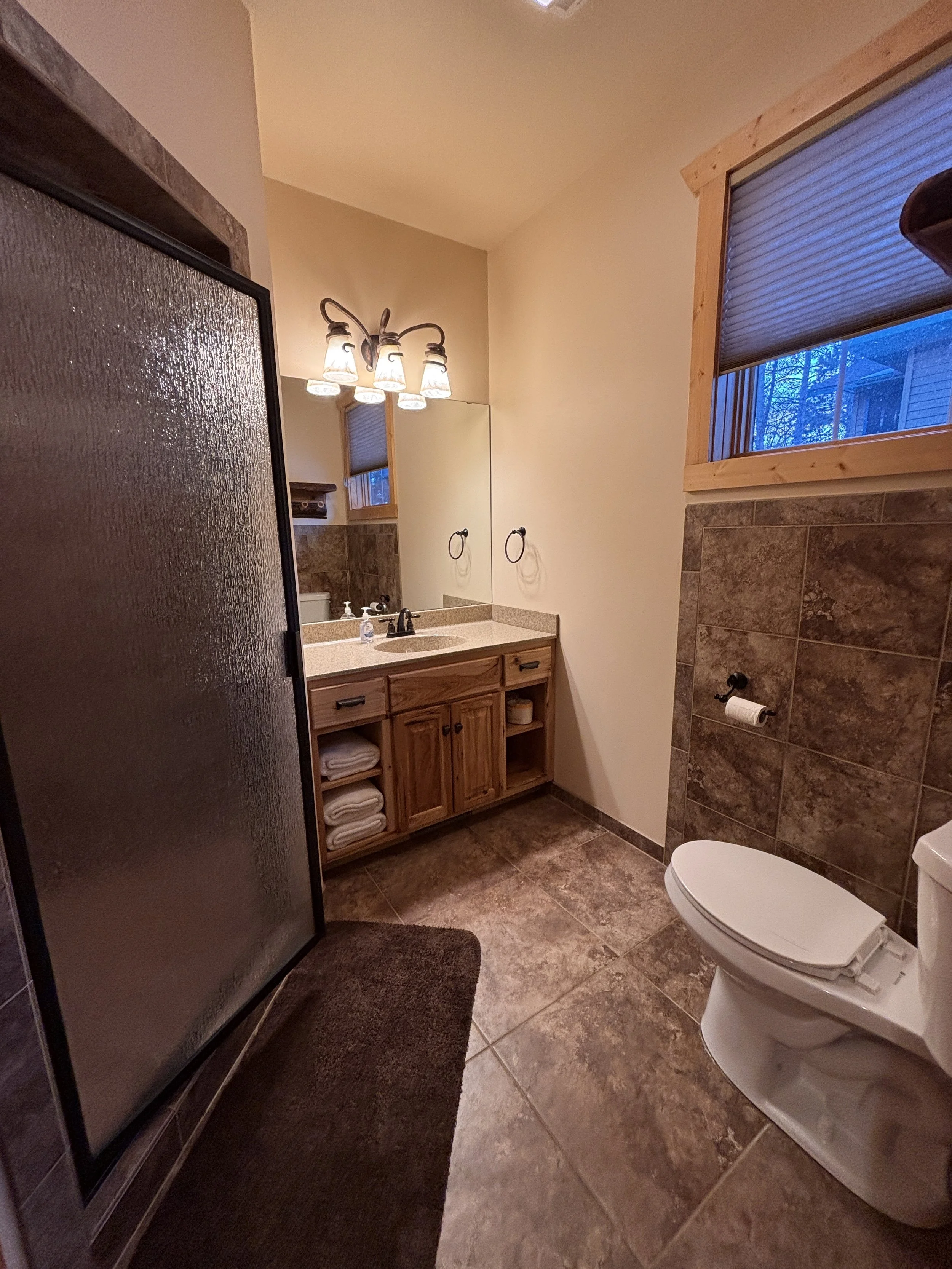 BEDROOM 1 - Main Floor: Queen Suite Bathroom