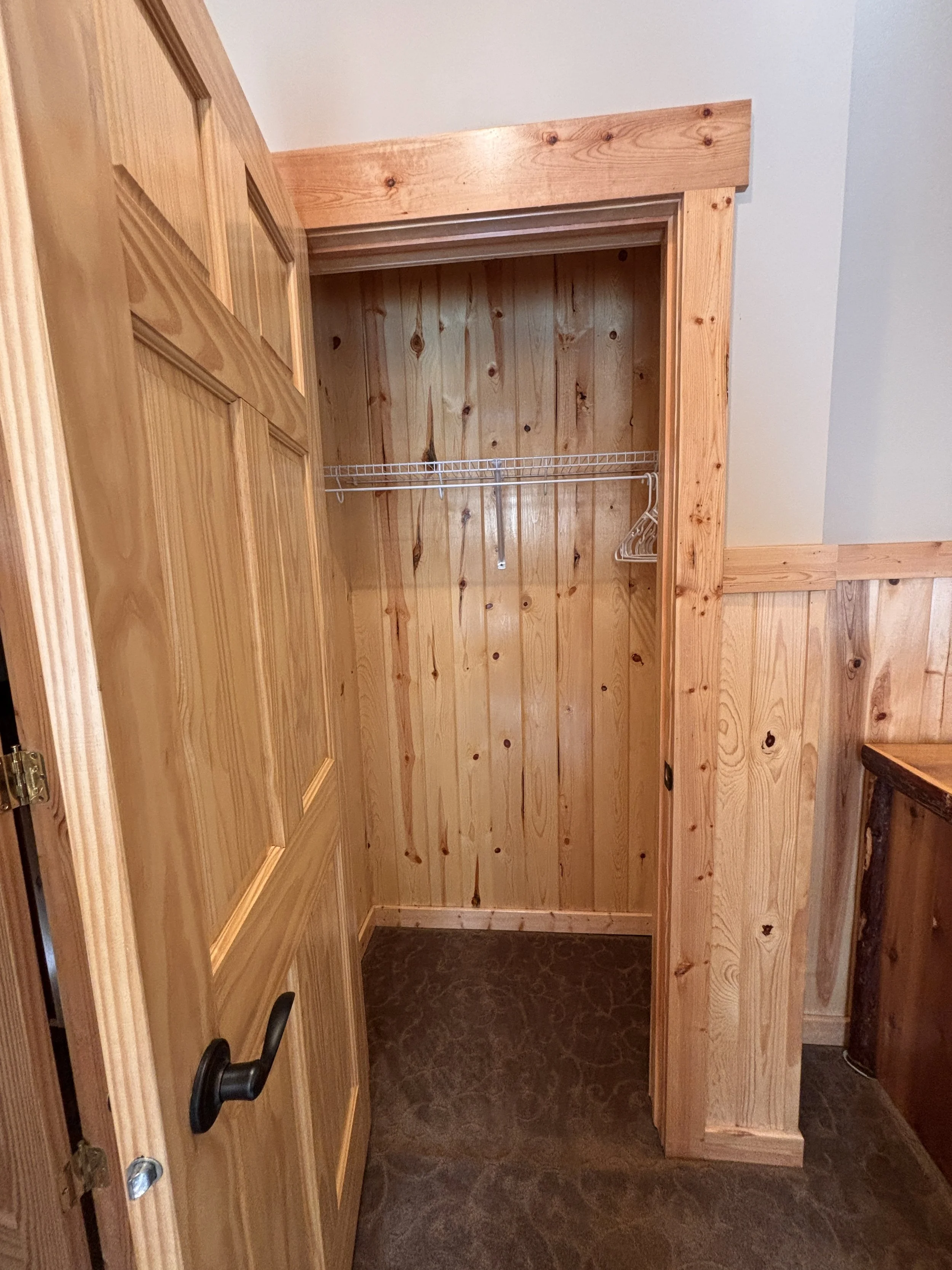 BEDROOM 1 - Main Floor: Queen Suite / Closet