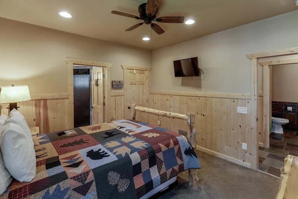 BEDROOM 1 - Main Floor: Queen Suite / Twin Trundle Bed