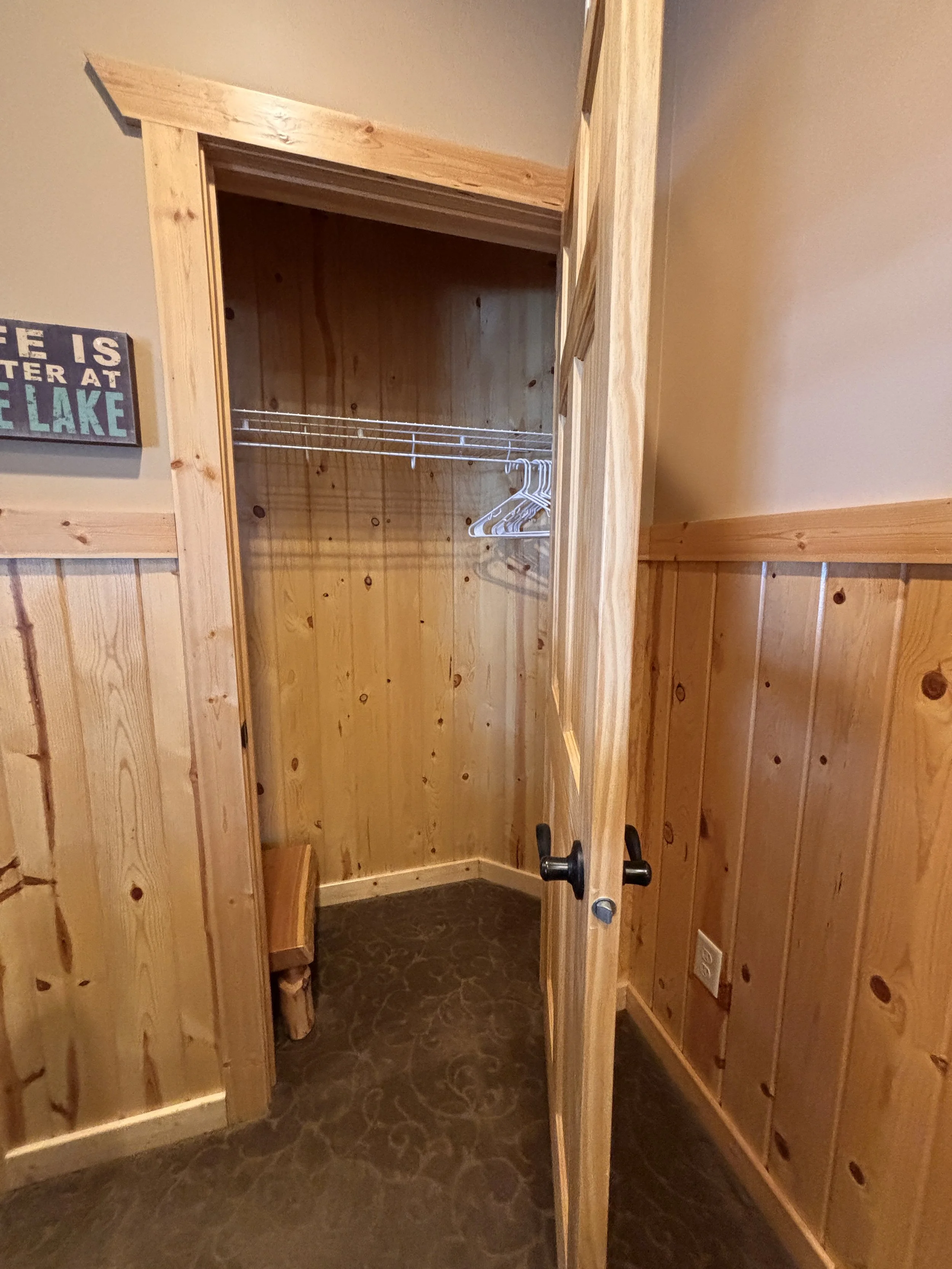 BEDROOM 1 - Main Floor: Queen Suite / Closet