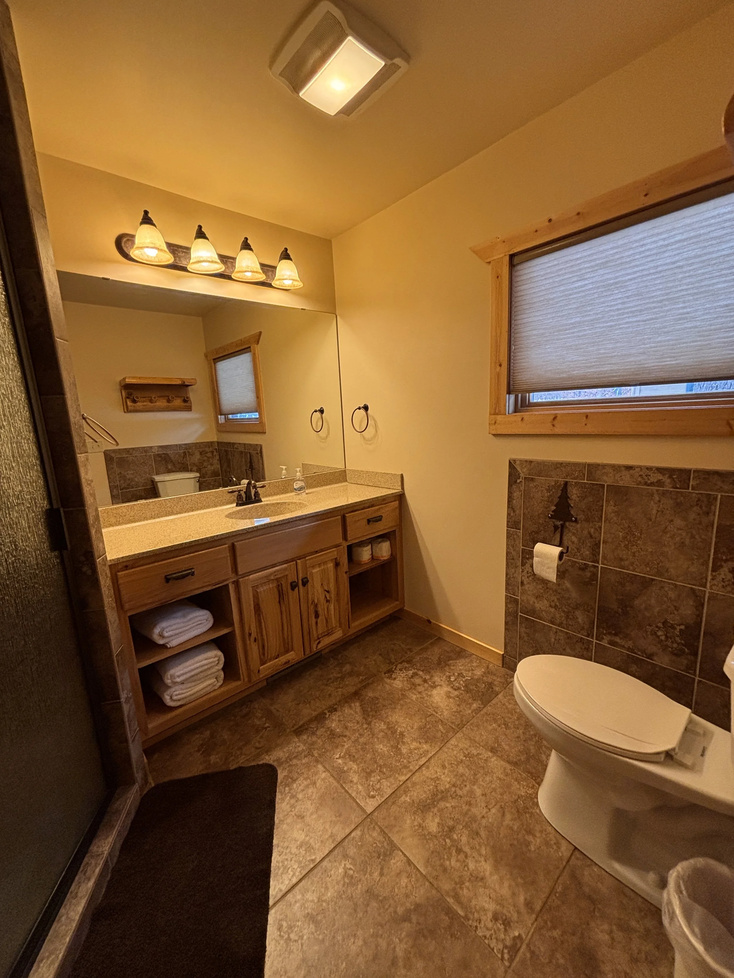 BEDROOM 1 - Main Floor: Queen Suite Bathroom