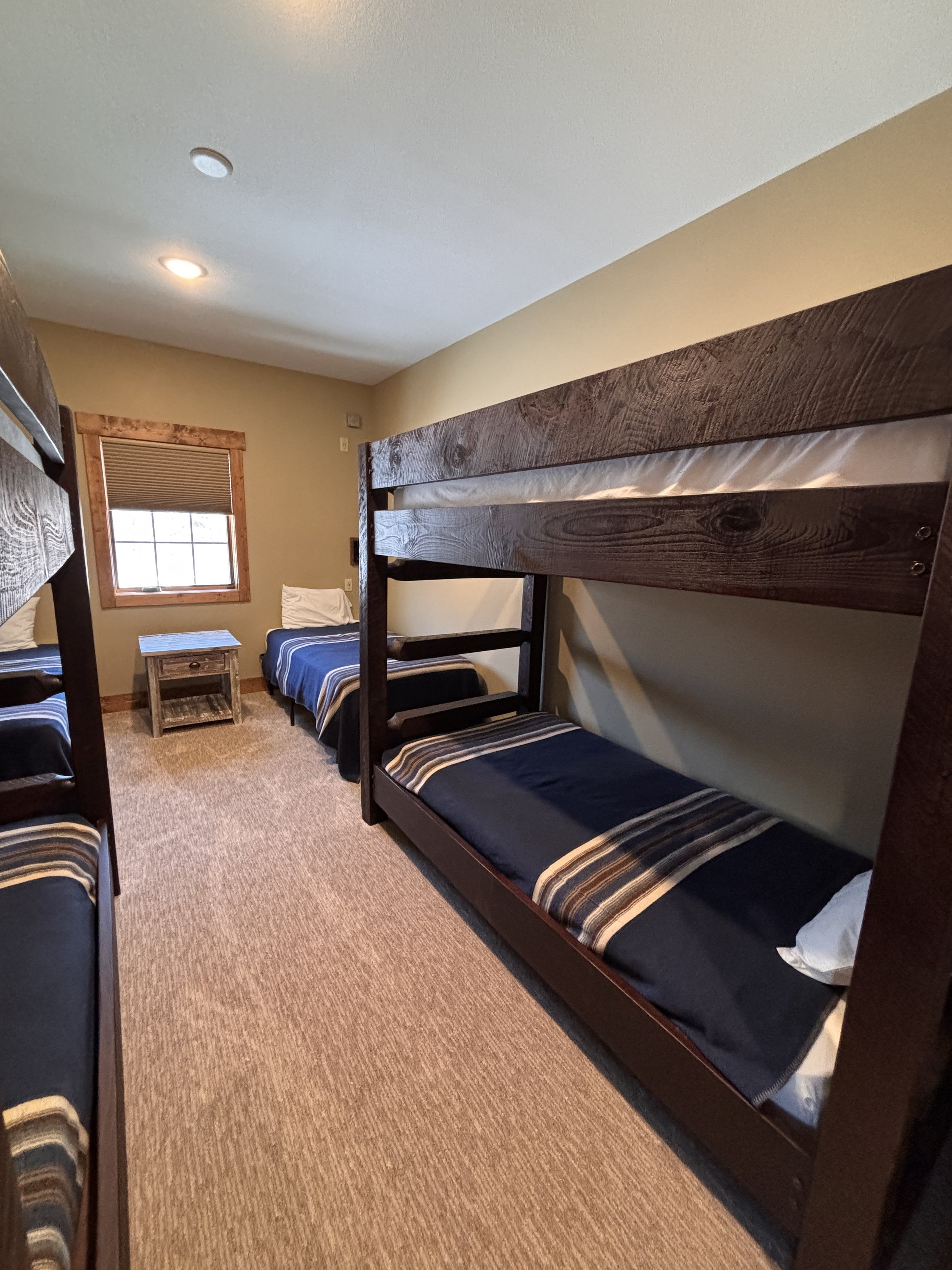BEDROOM 2 - Second Floor:  (2) Twin over Twin Bunk Beds / (2) Single Twin Beds