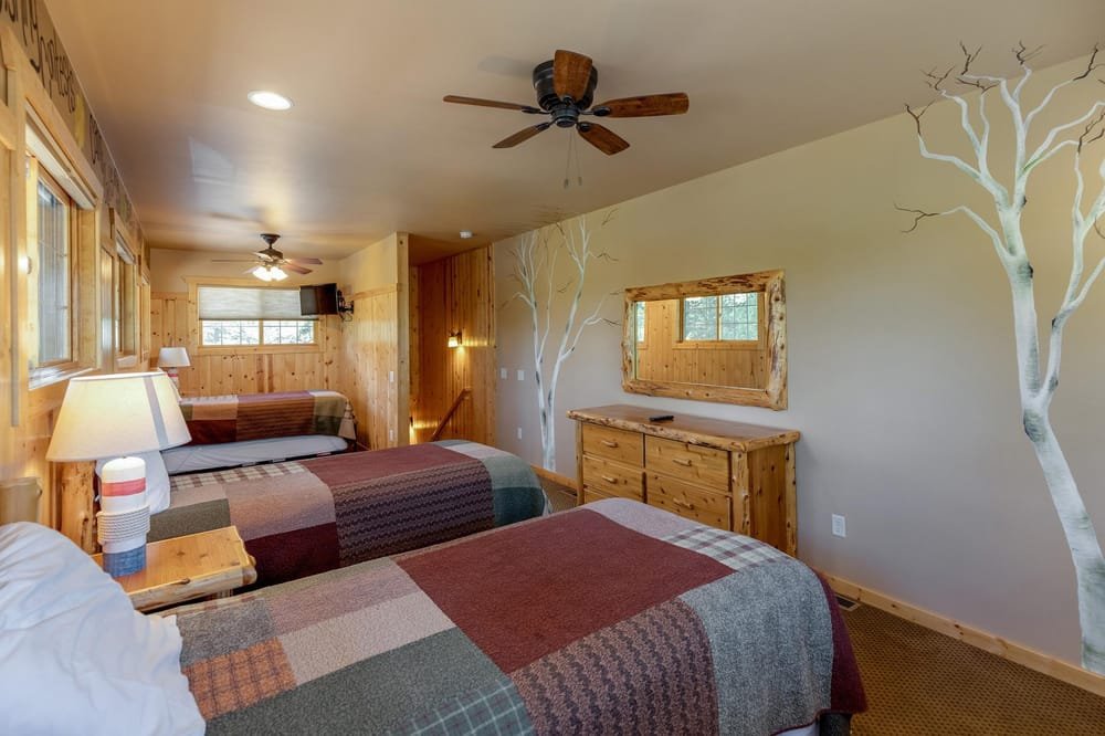 BEDROOM 4 - Third Floor: Loft Bedroom with 3 Twin Beds & 3 Twin Trundle Beds 