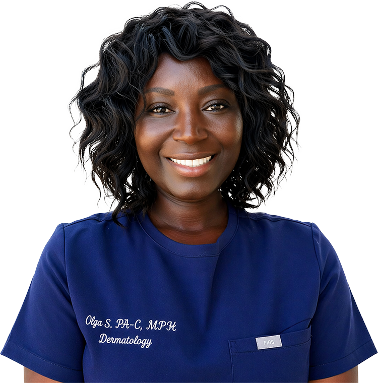 A smiling woman with curly black hair wearing a blue medical scrub top with her name and credentials embroidered on it.