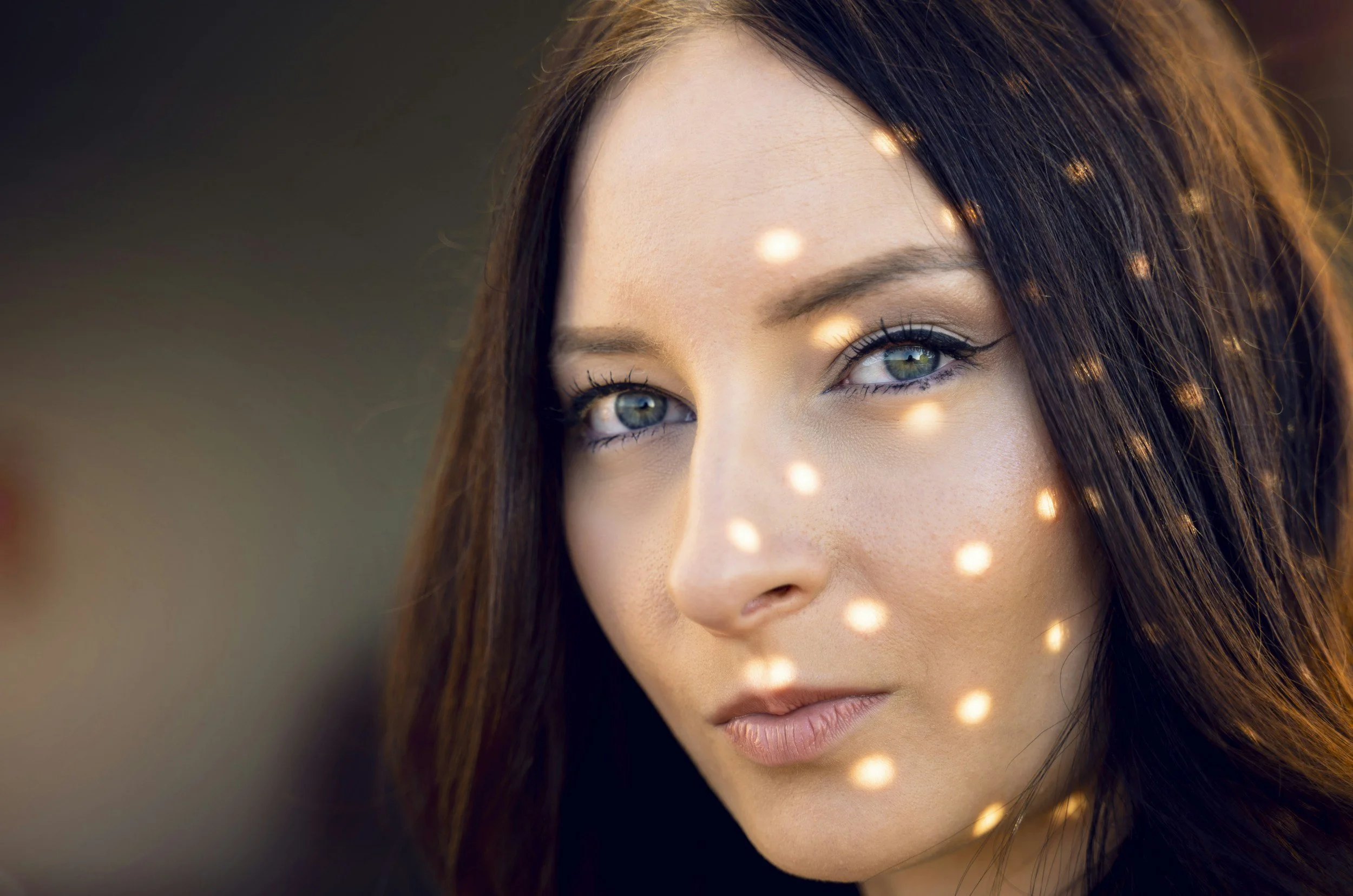 Woman's face with artistic lighting