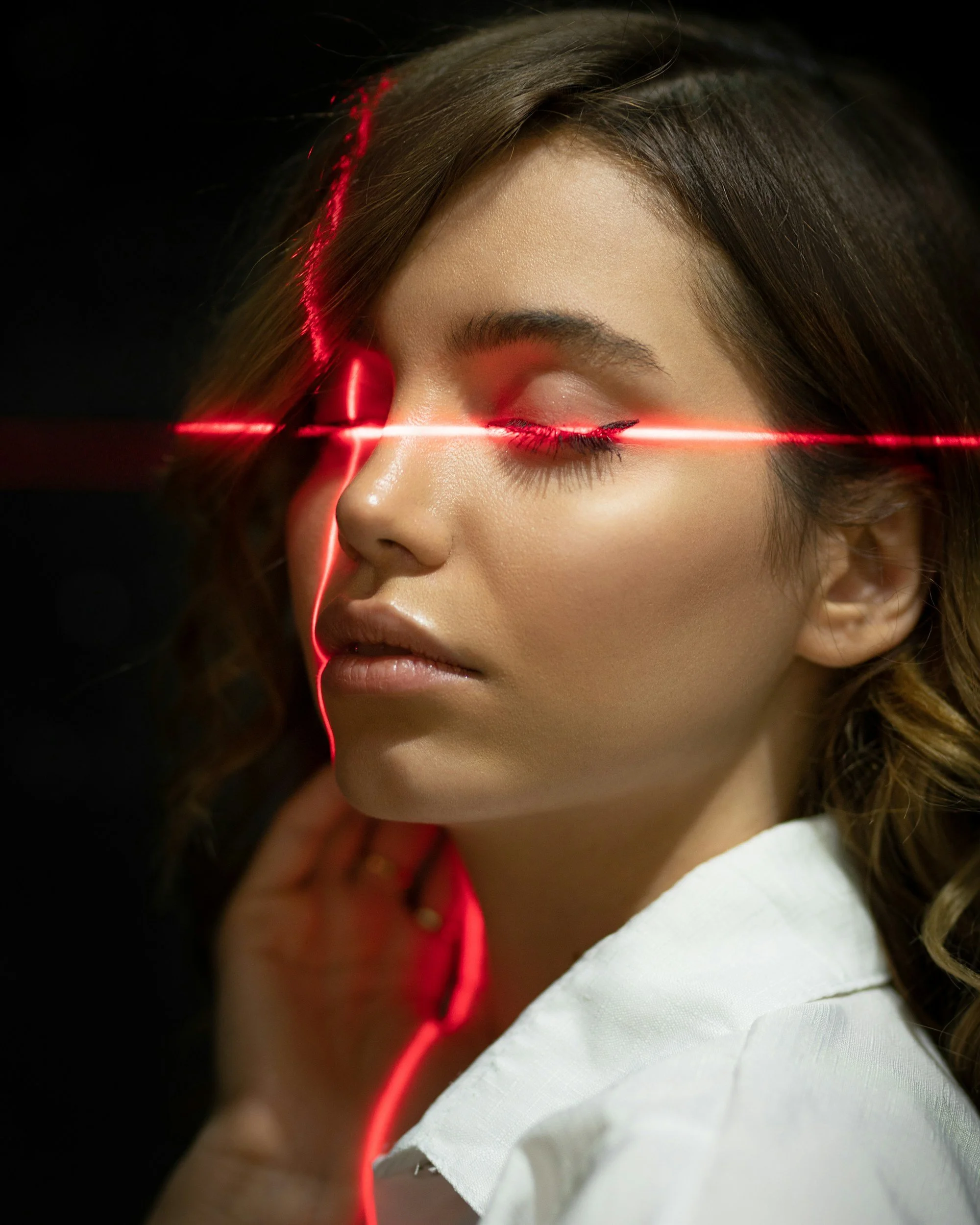 Facial laser on a woman's face