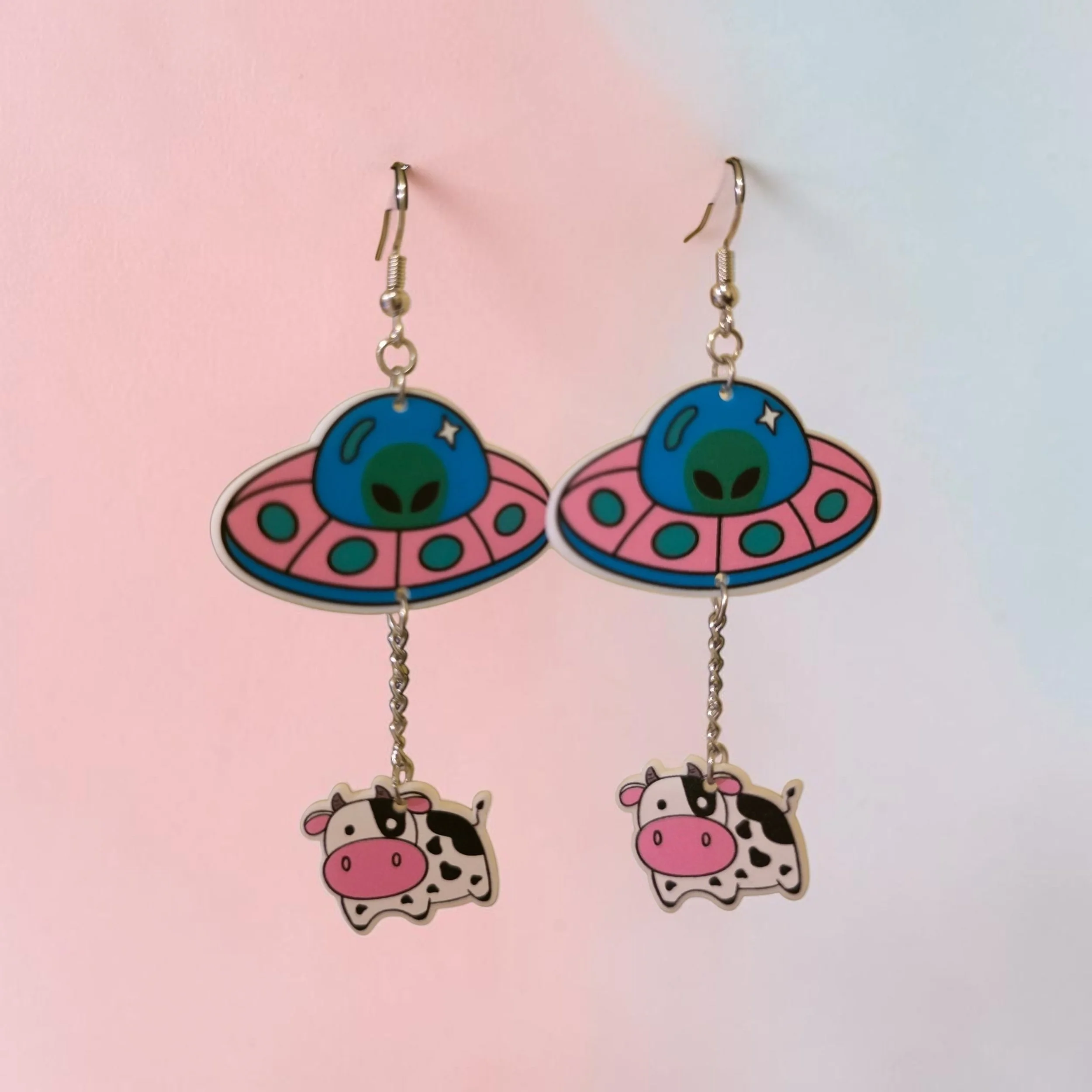 Cow abduction earrings