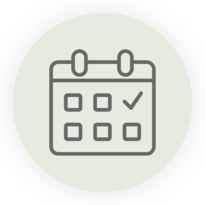 Calendar icon with a check mark on one date, green background.