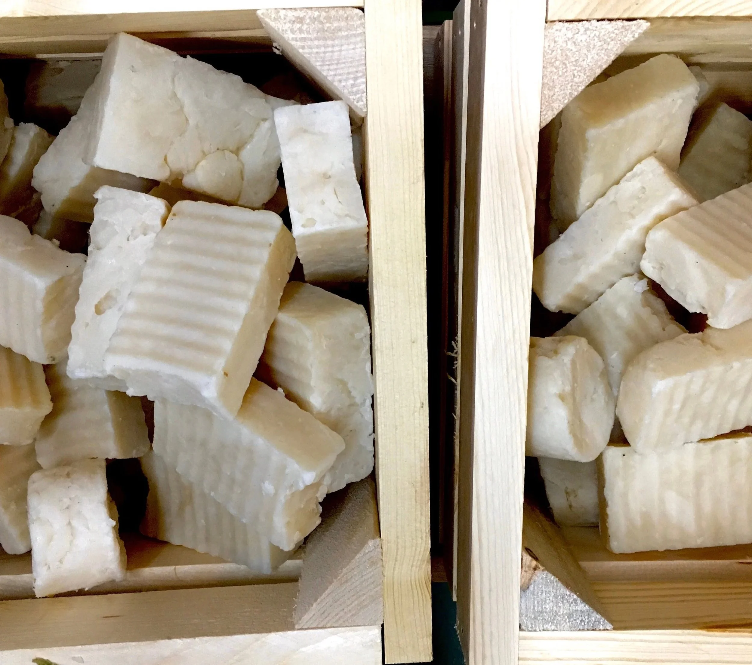 wooden crates full of soap bars