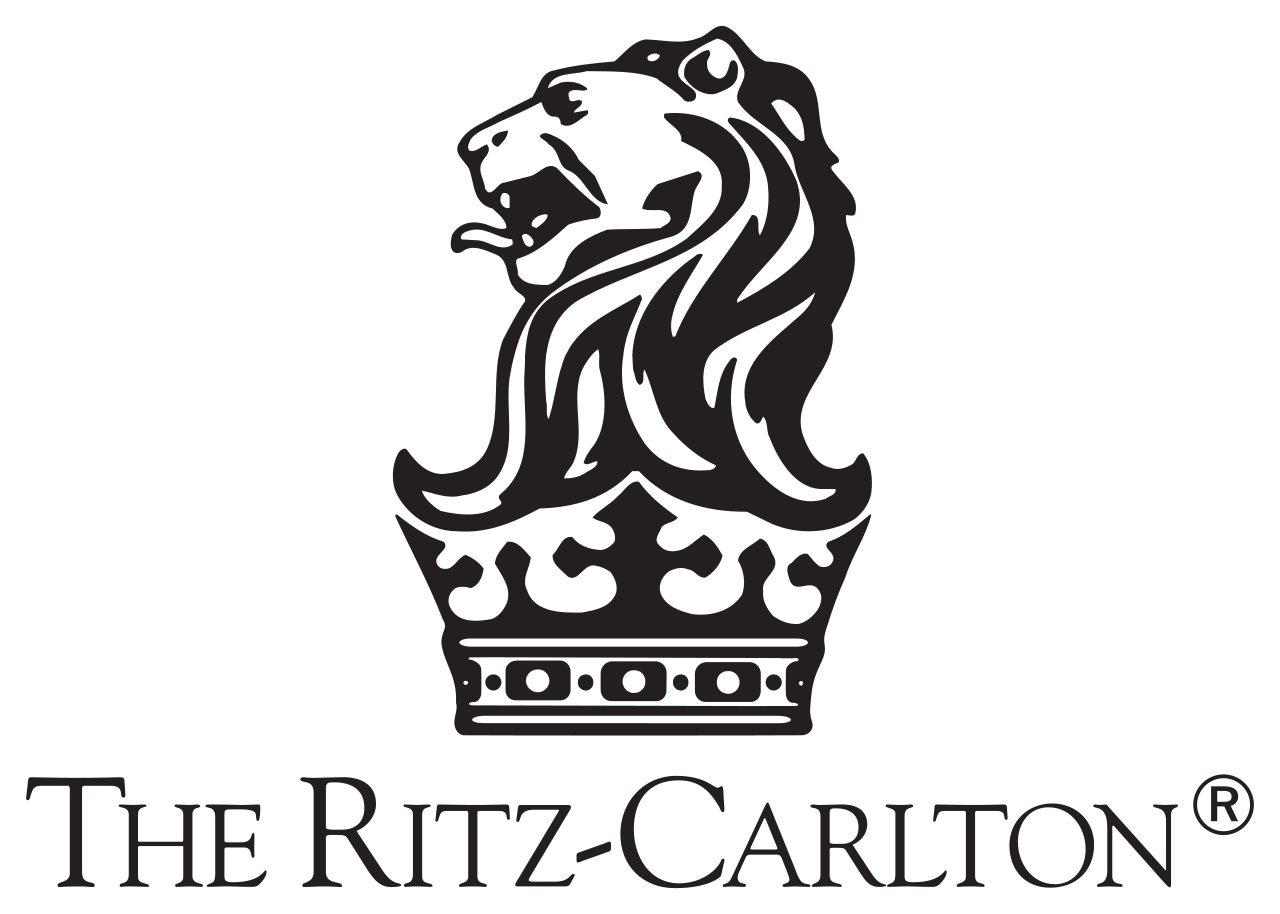 Black and white logo of a crowned lion's head with open mouth, above the text 'The Ritz-Carlton'.