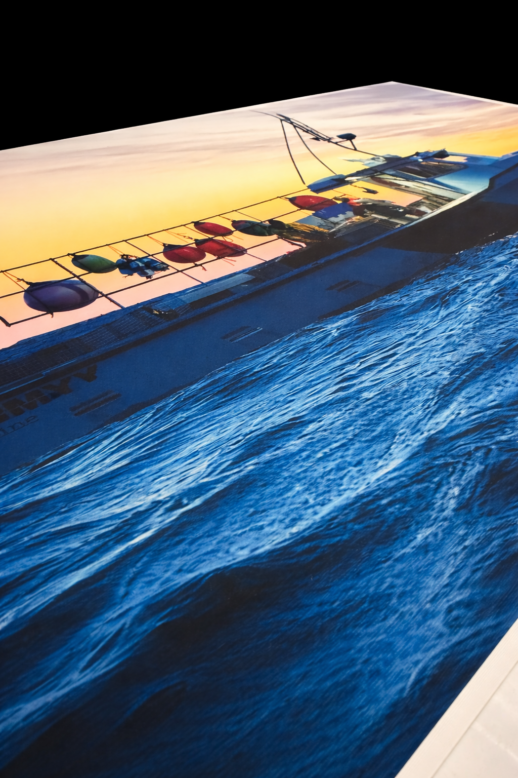 Canvas print detail — boat at sunset close up