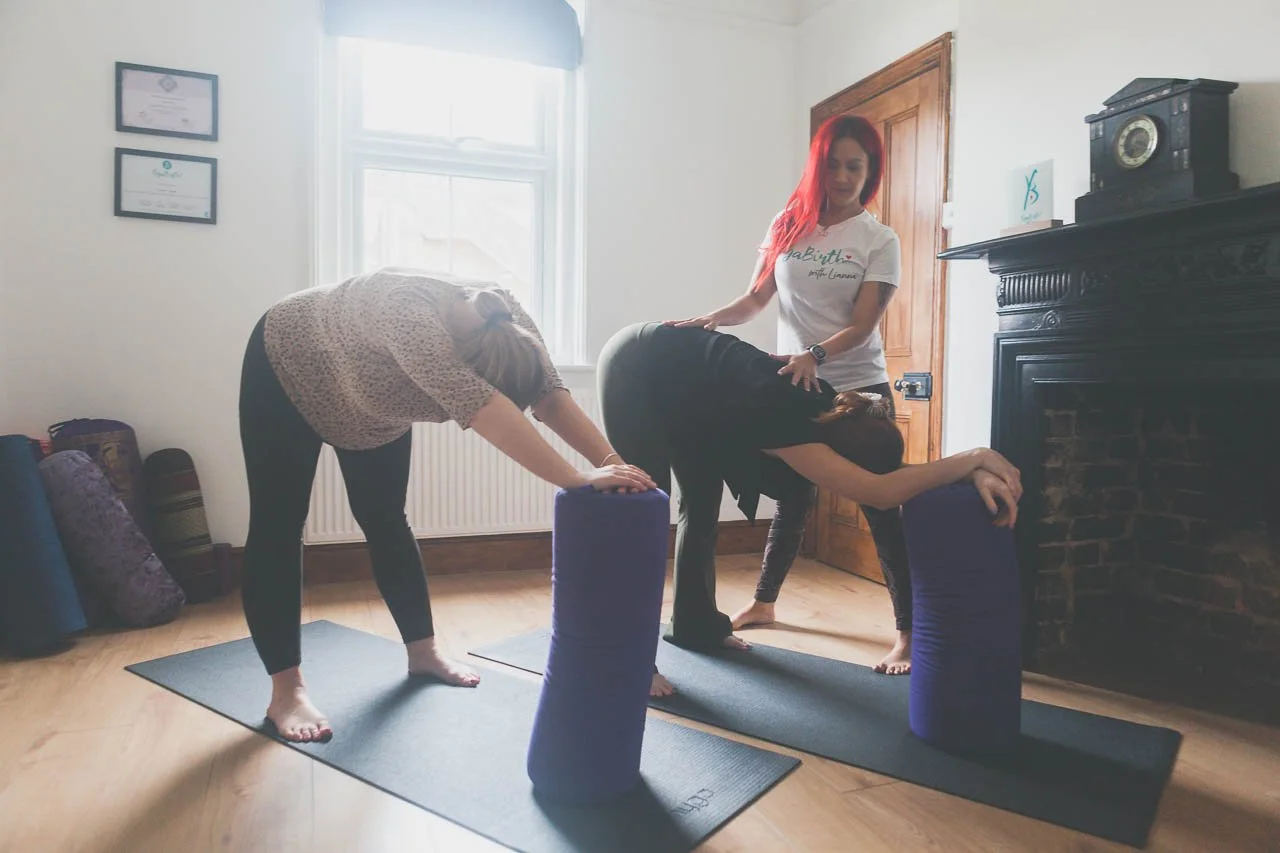 Lianna teching a pregnancy yoga class.jpg