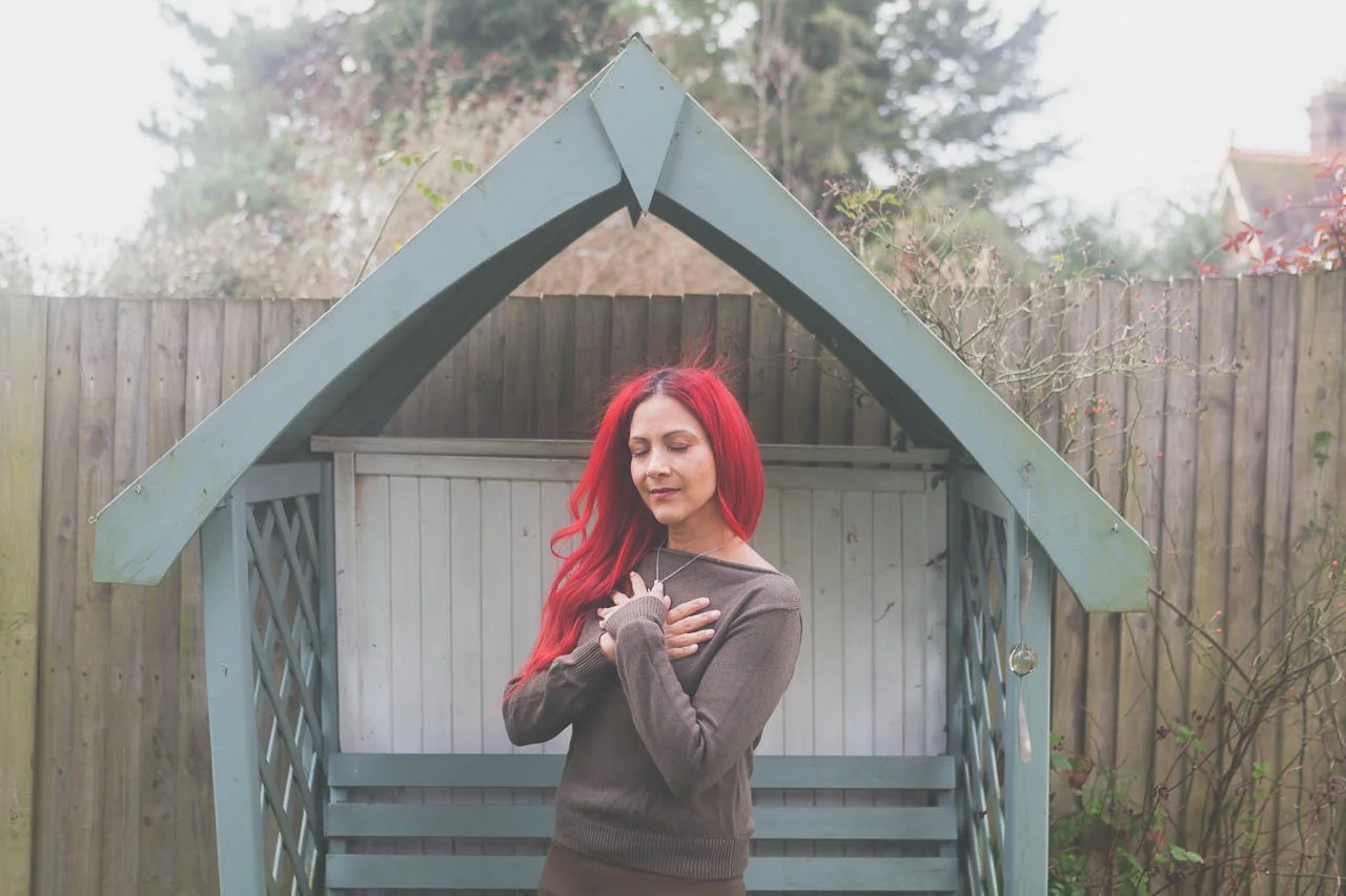 Lianna outside with hands across her chest