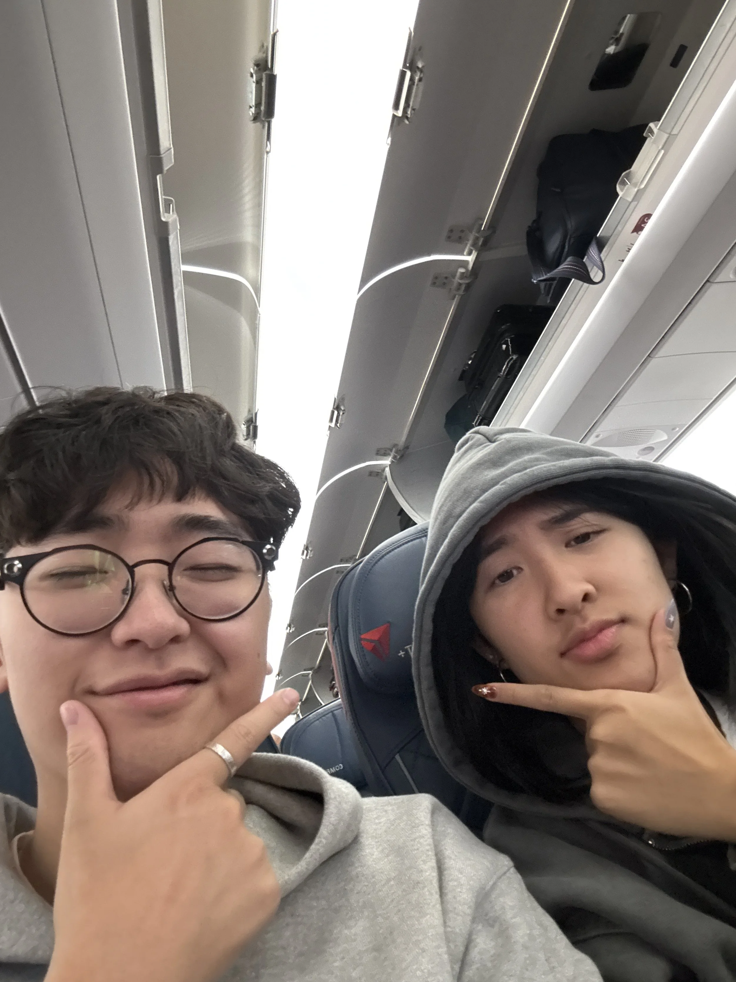 bannah and beiji on the flight to london! to mr. dad (my dad) - he really thinks you're so funny, and that makes me so so happy