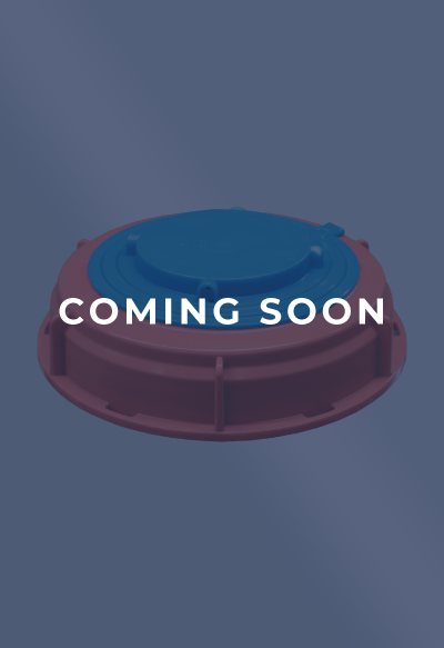 A circular object with a blue top and reddish base displays the words "COMING SOON" in white text.