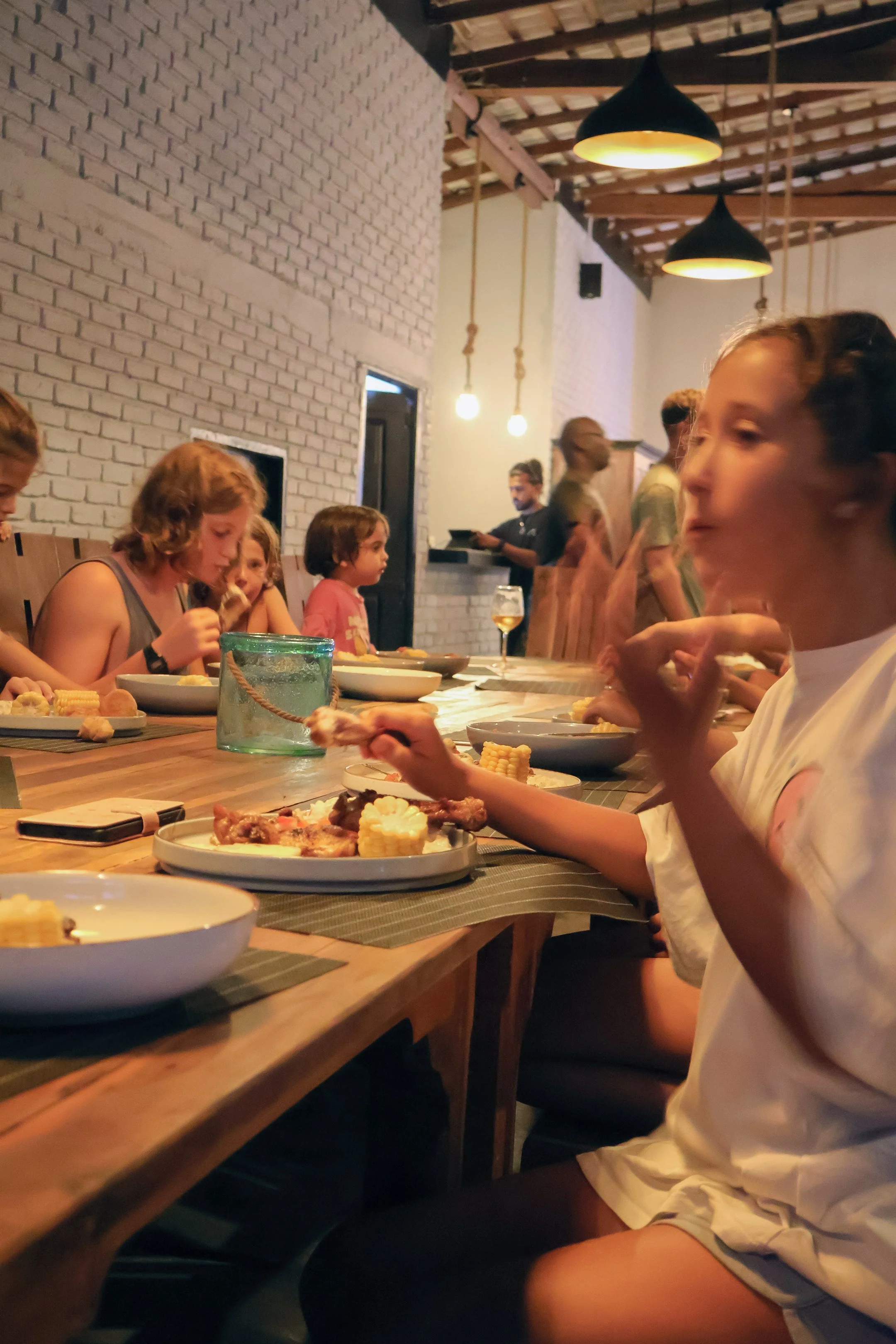 Kids eating together on a community cook event