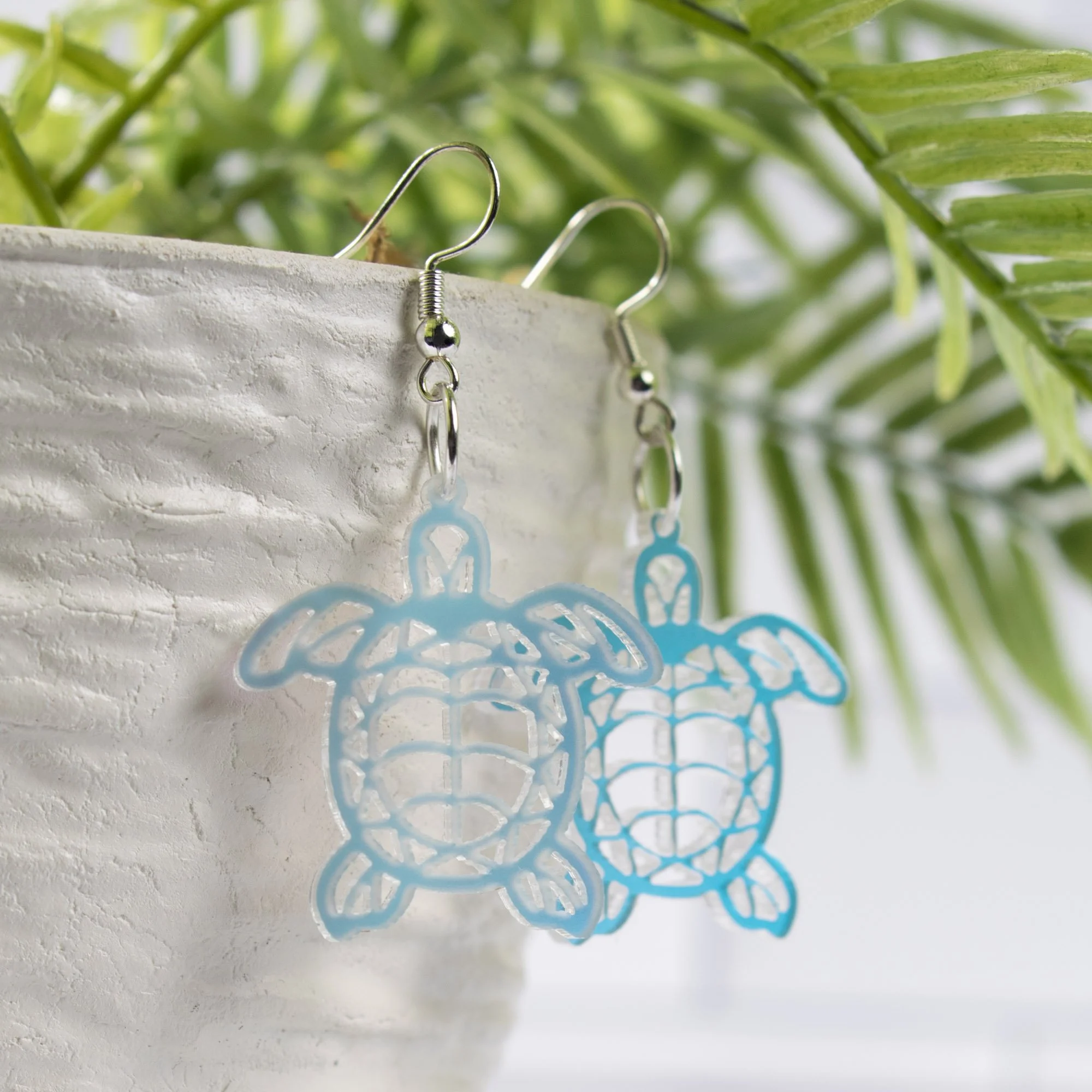 Turtle Earrings Hanging copy.jpg